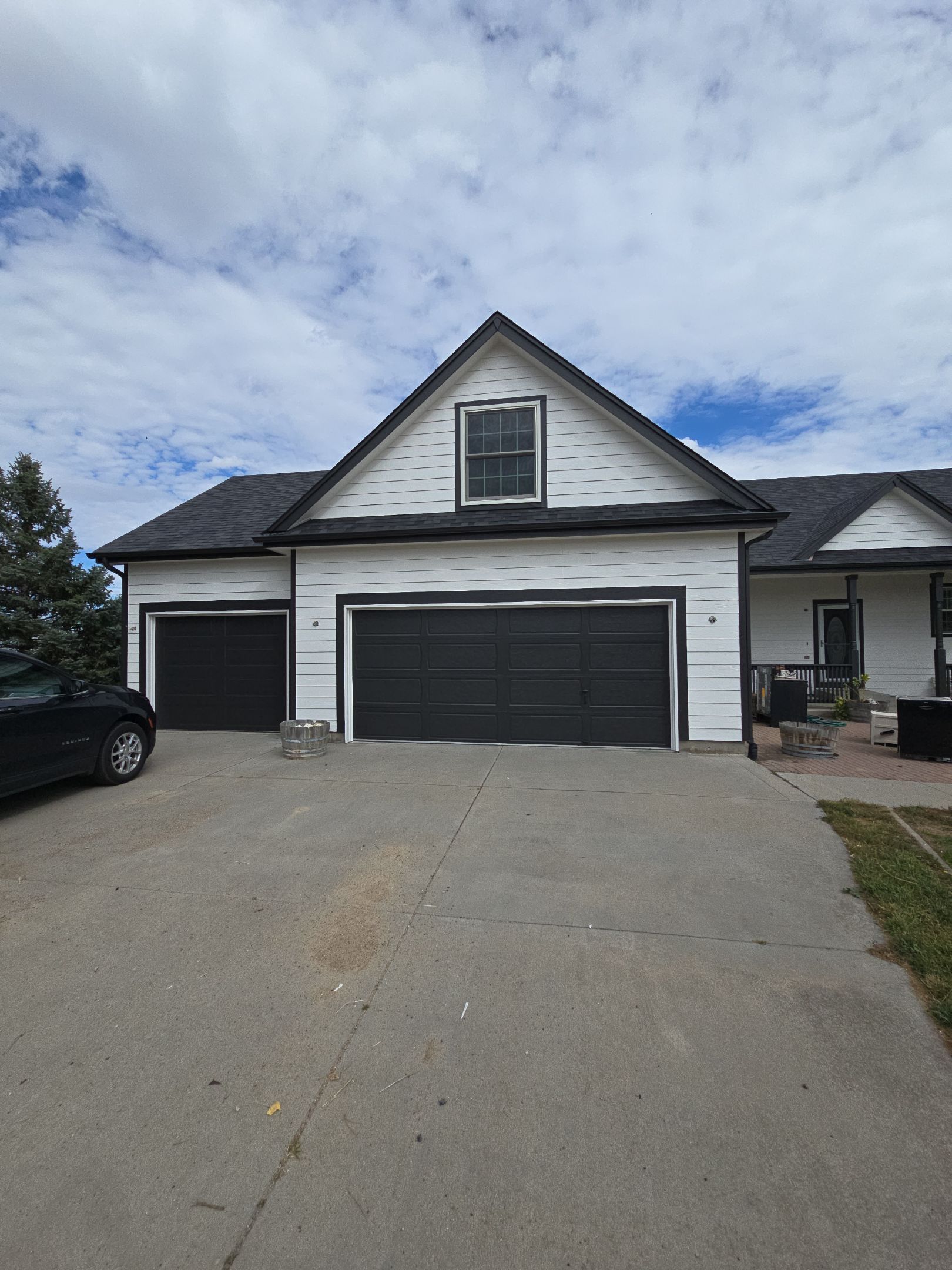 From Faded to Timeless: White & Black Exterior Renewal by J&M Painting LLC