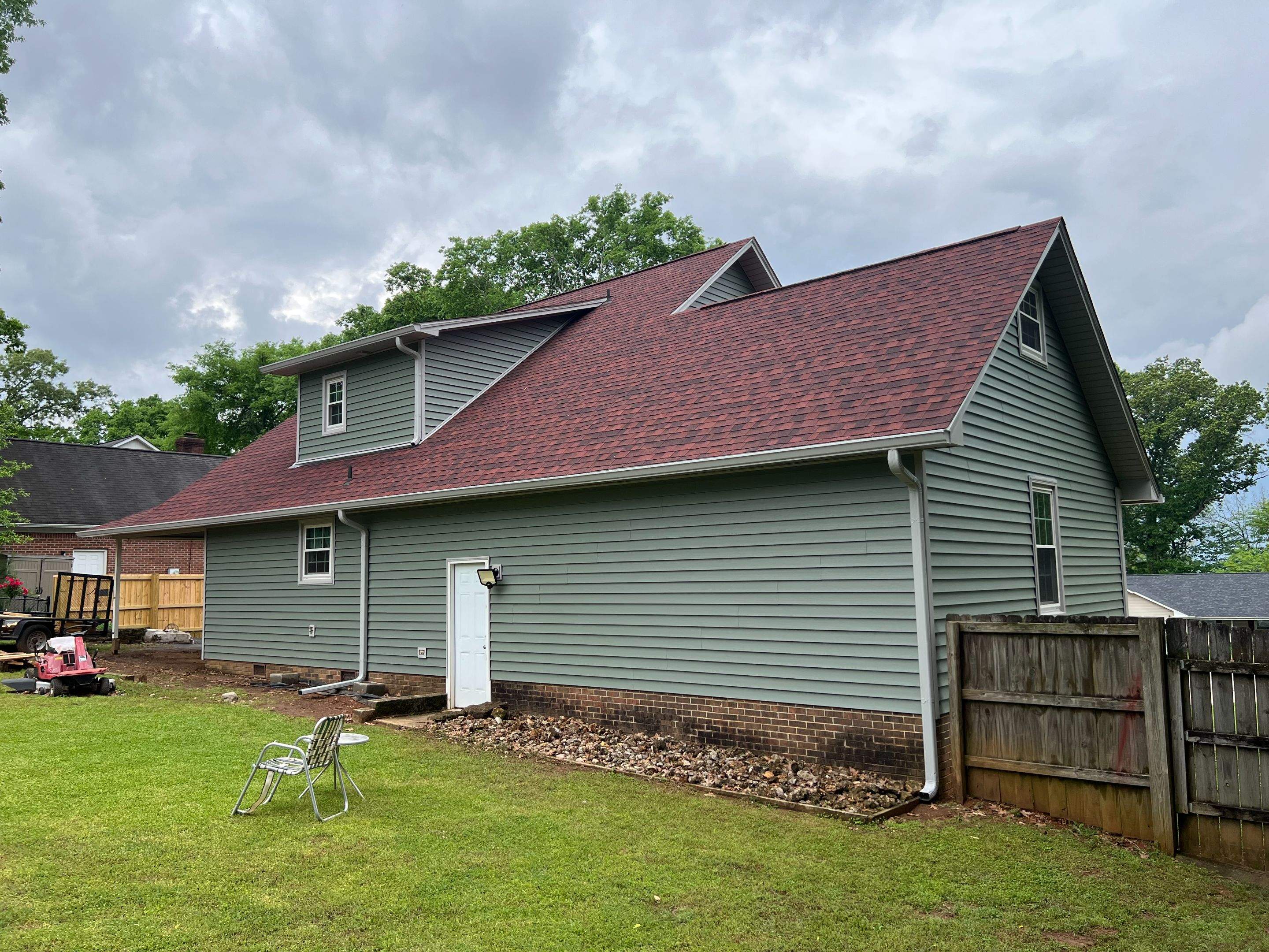 Siding Replacement using Mastic Carvedwood Vinyl Plank by Freedom Exteriors
