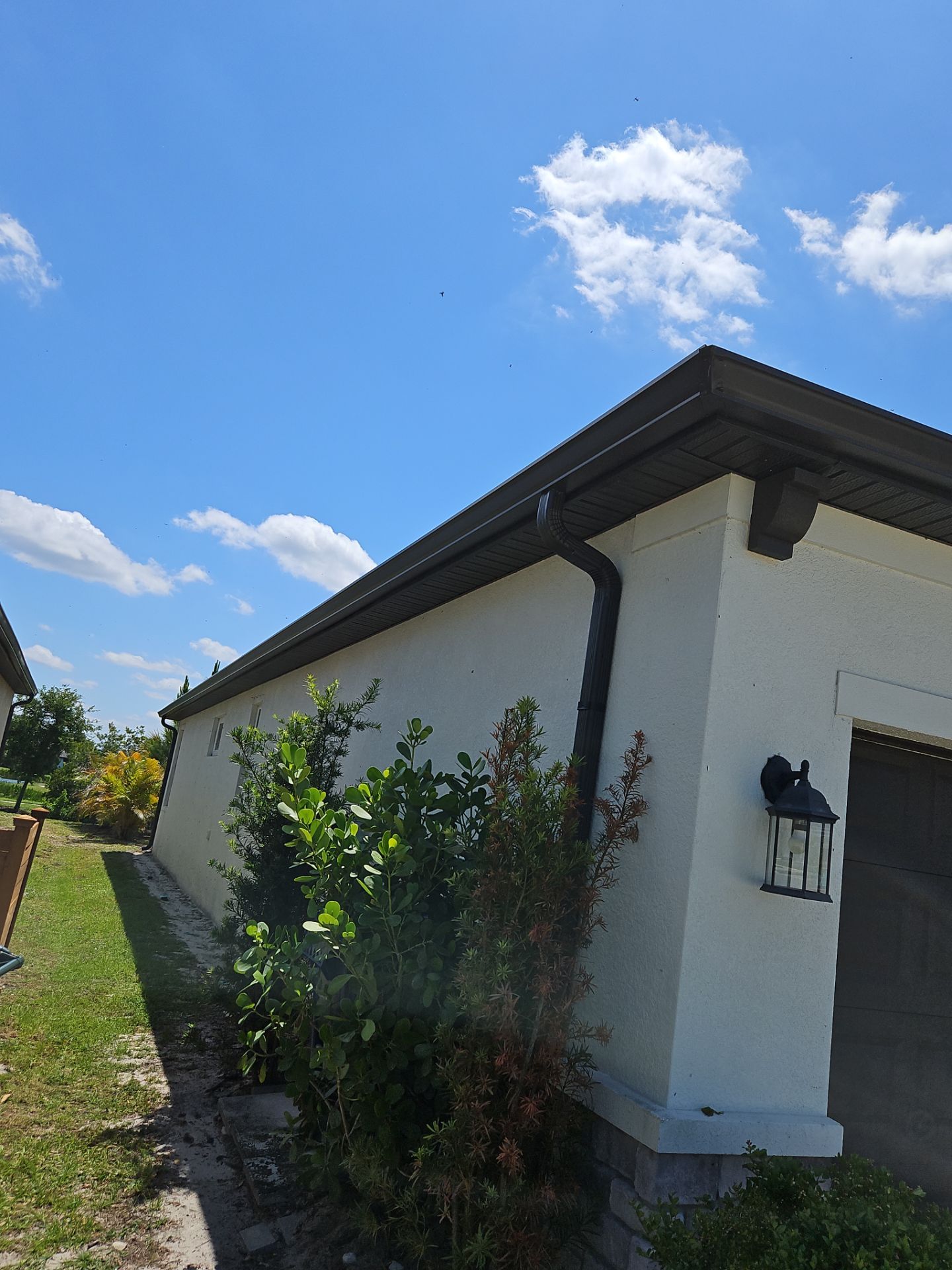 K-Style Seamless Gutter Installation using bronze gutters in Sarasota FL by Gutter Professors