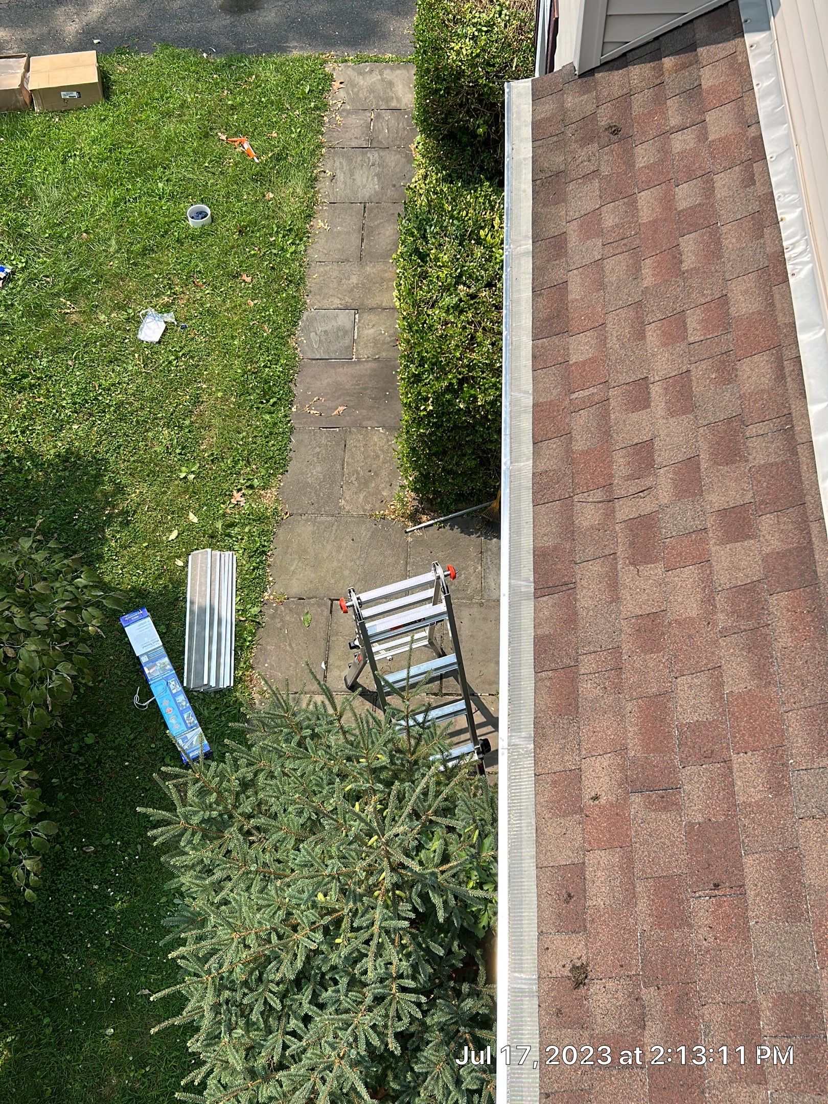 Gutter Installation using 5k White gutters by A Plus Exterior