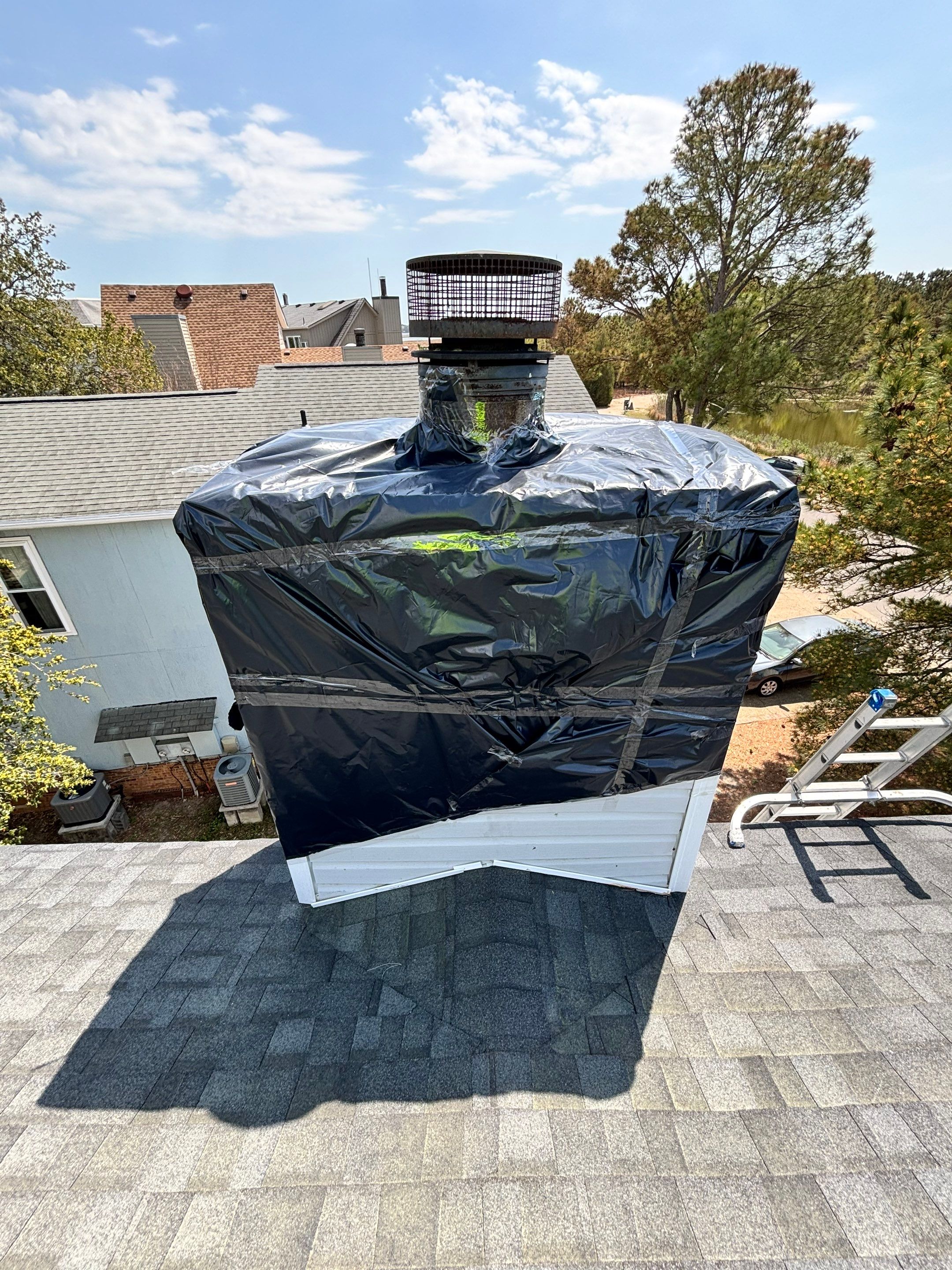 Chimney Leak Repair - Chase Cover, Cap, and Siding by Premier Chimney and Roofing