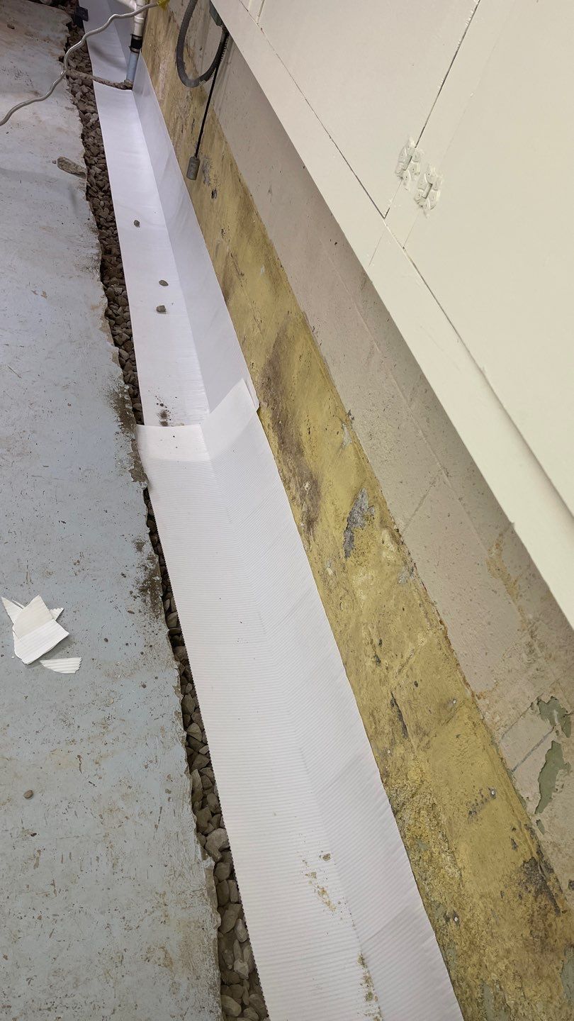 Interior Waterproofing Using GrateDrain™ Products by Toledo Basement Repair 