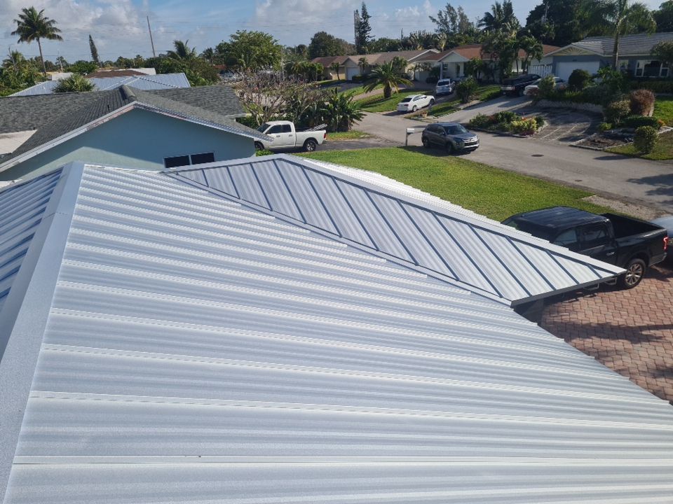 Residential Roofing Installation using 1" Nail strip metal roof by BLUES BROTHERS ROOFING