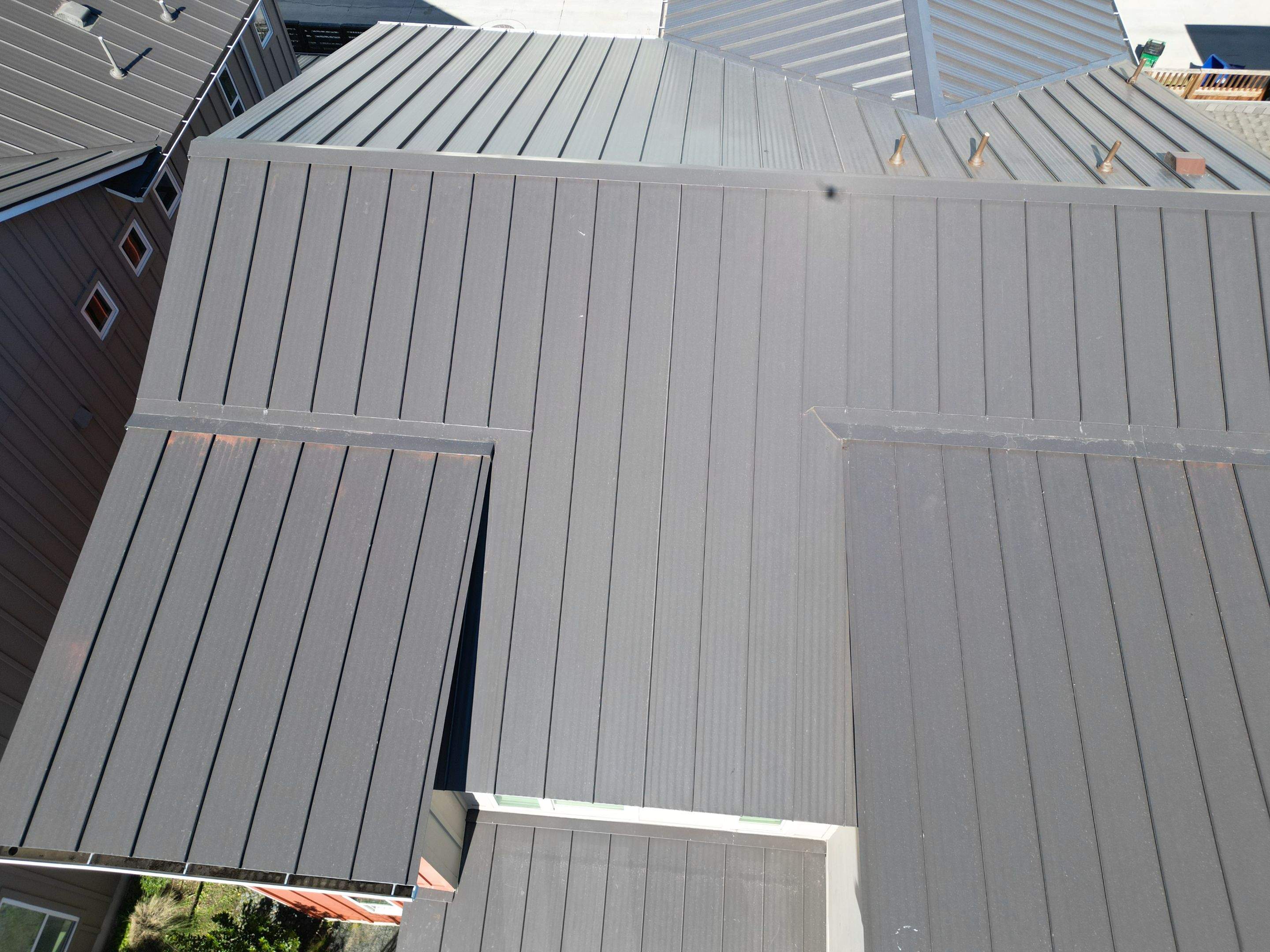 Dark Bronze Standing Seam Metal Roof by RoofsOnly.com