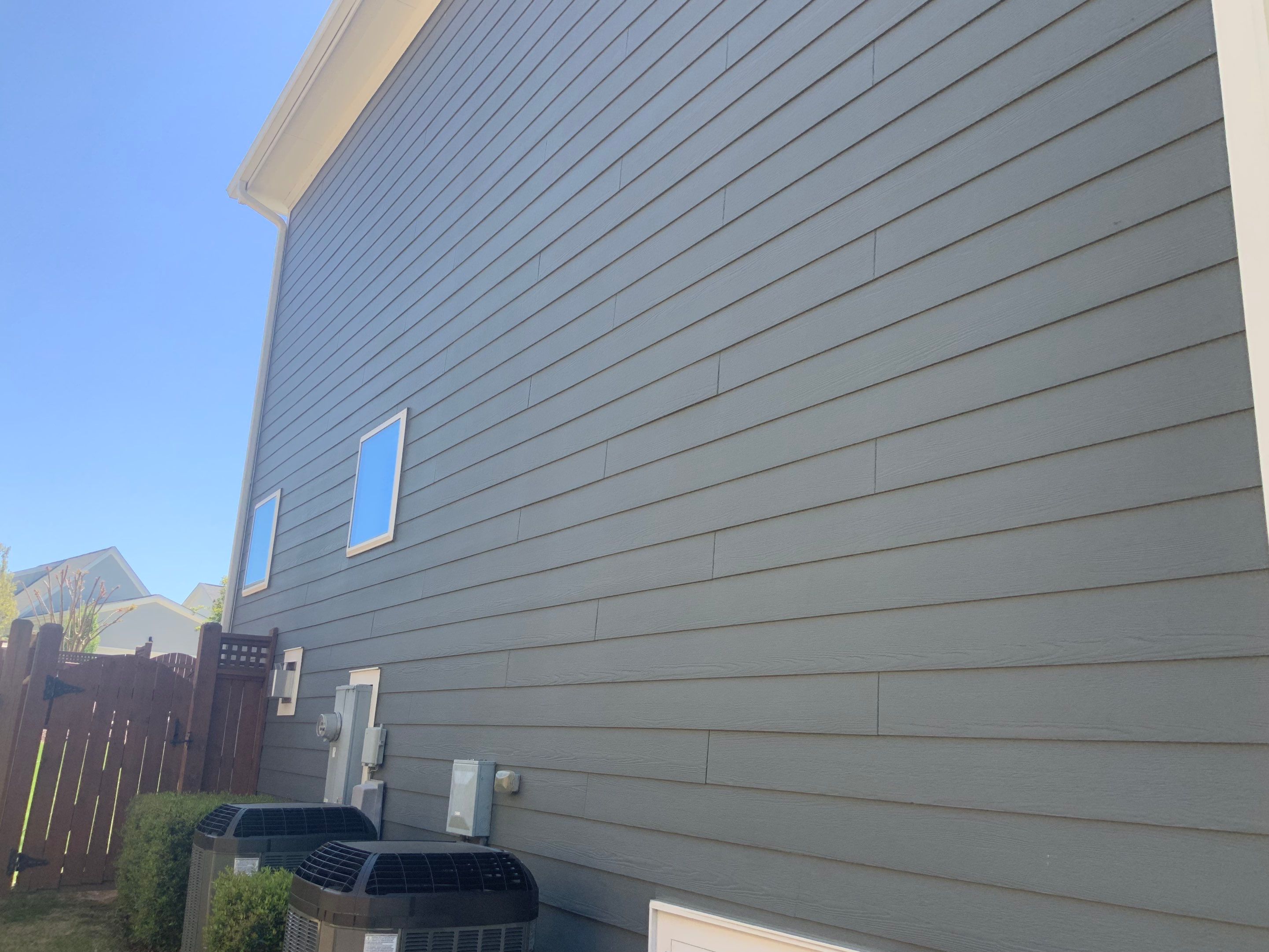 Siding replacement and exterior painting by GonzalezPainters & Contractors Inc