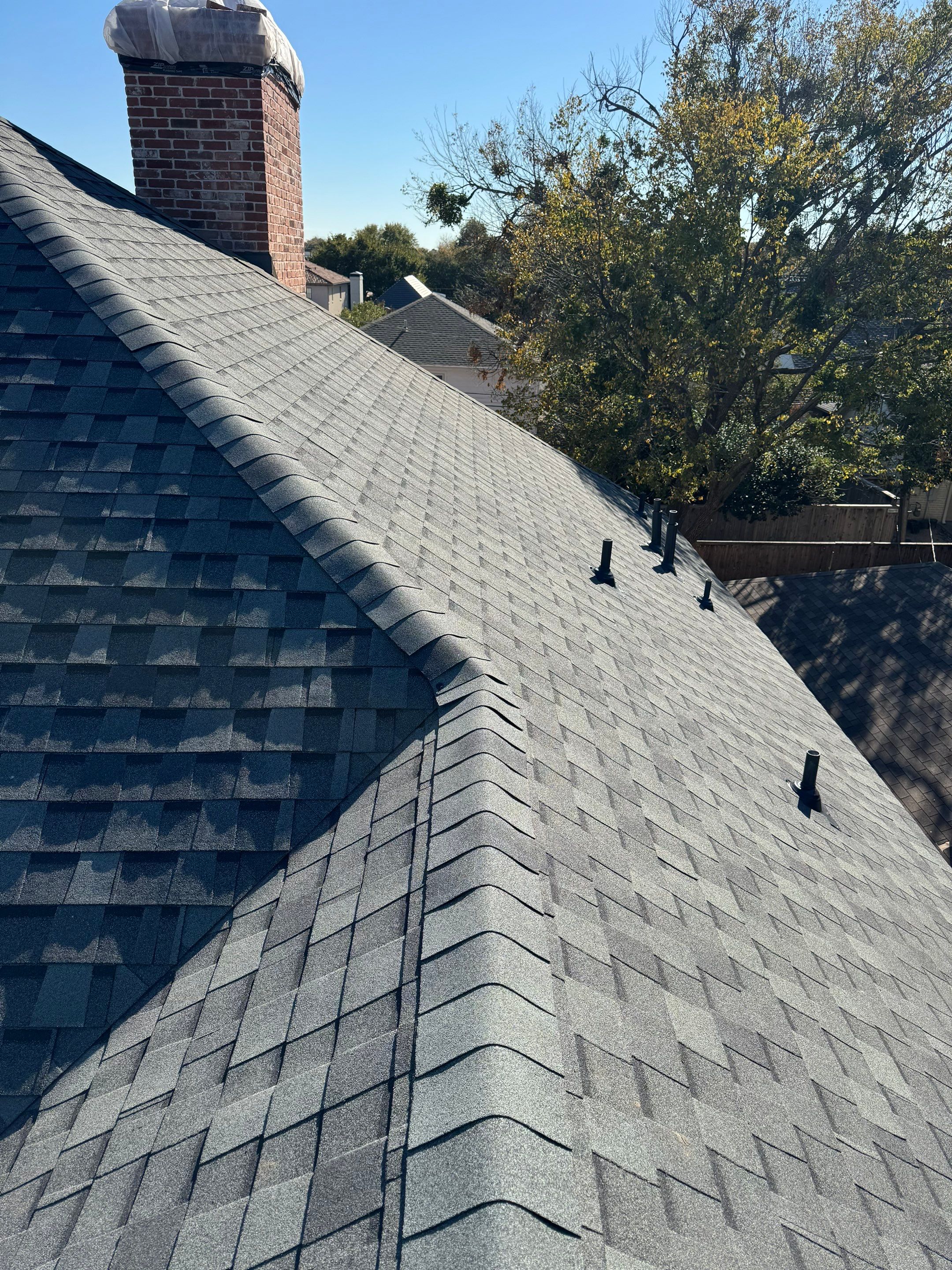 Residential Roofing Installation using ATLAS Signature Select Roof System by Harvey Roofing & Construction