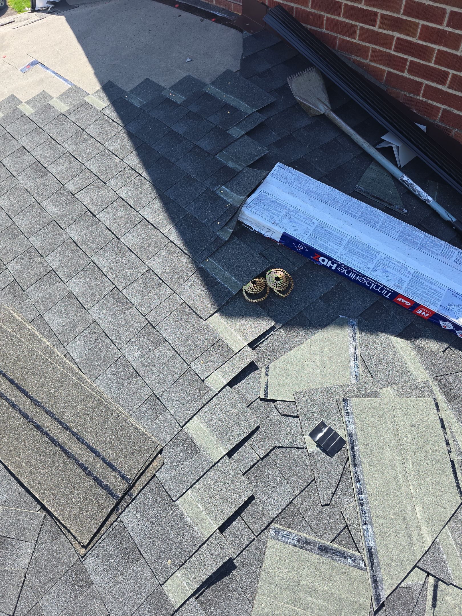 Residential Roofing Installation using GAF Timberline HDZ Charcoal by Rainstoppers Roofing