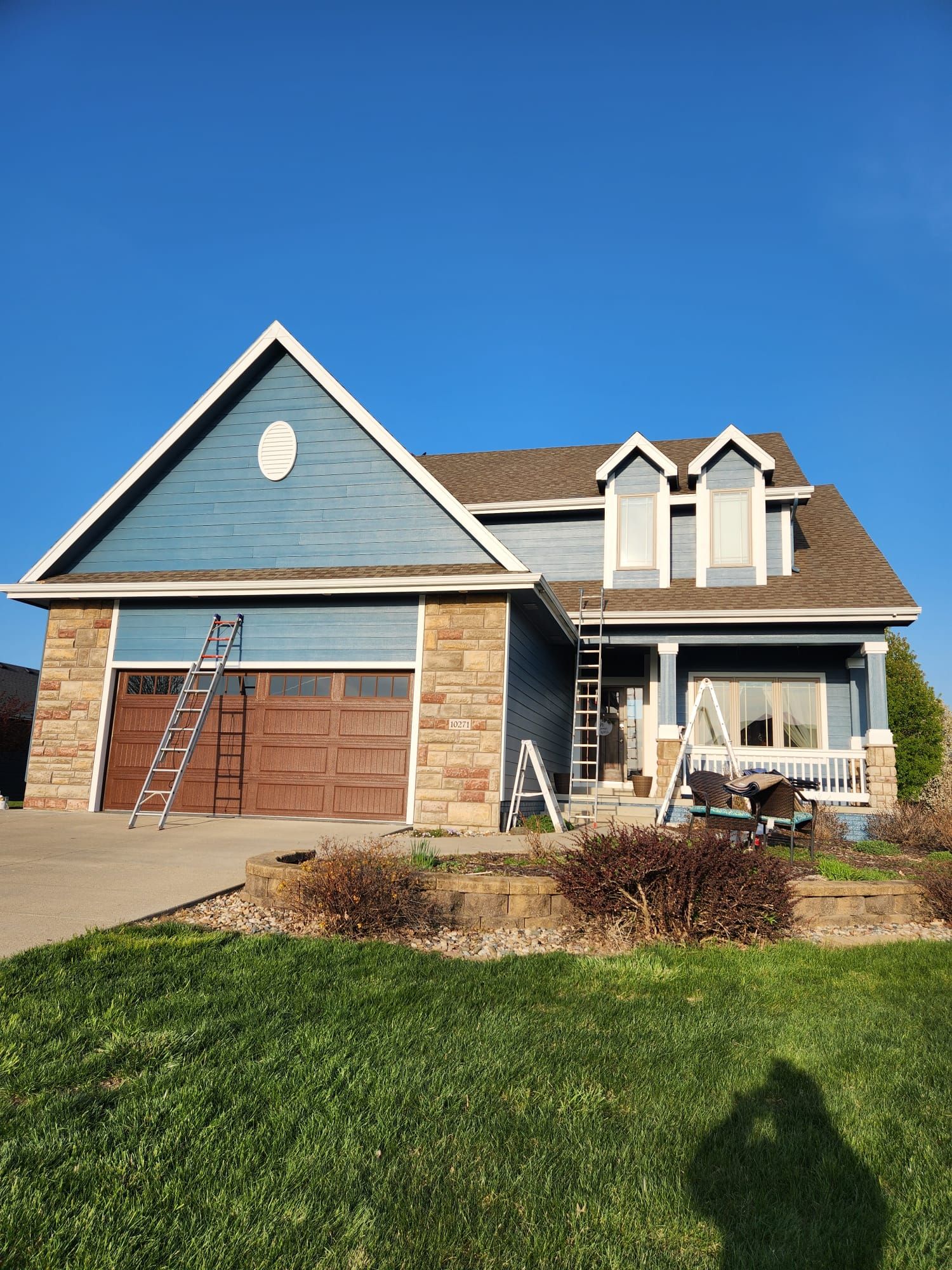 Exterior house painting color change by Cutting edge painting 