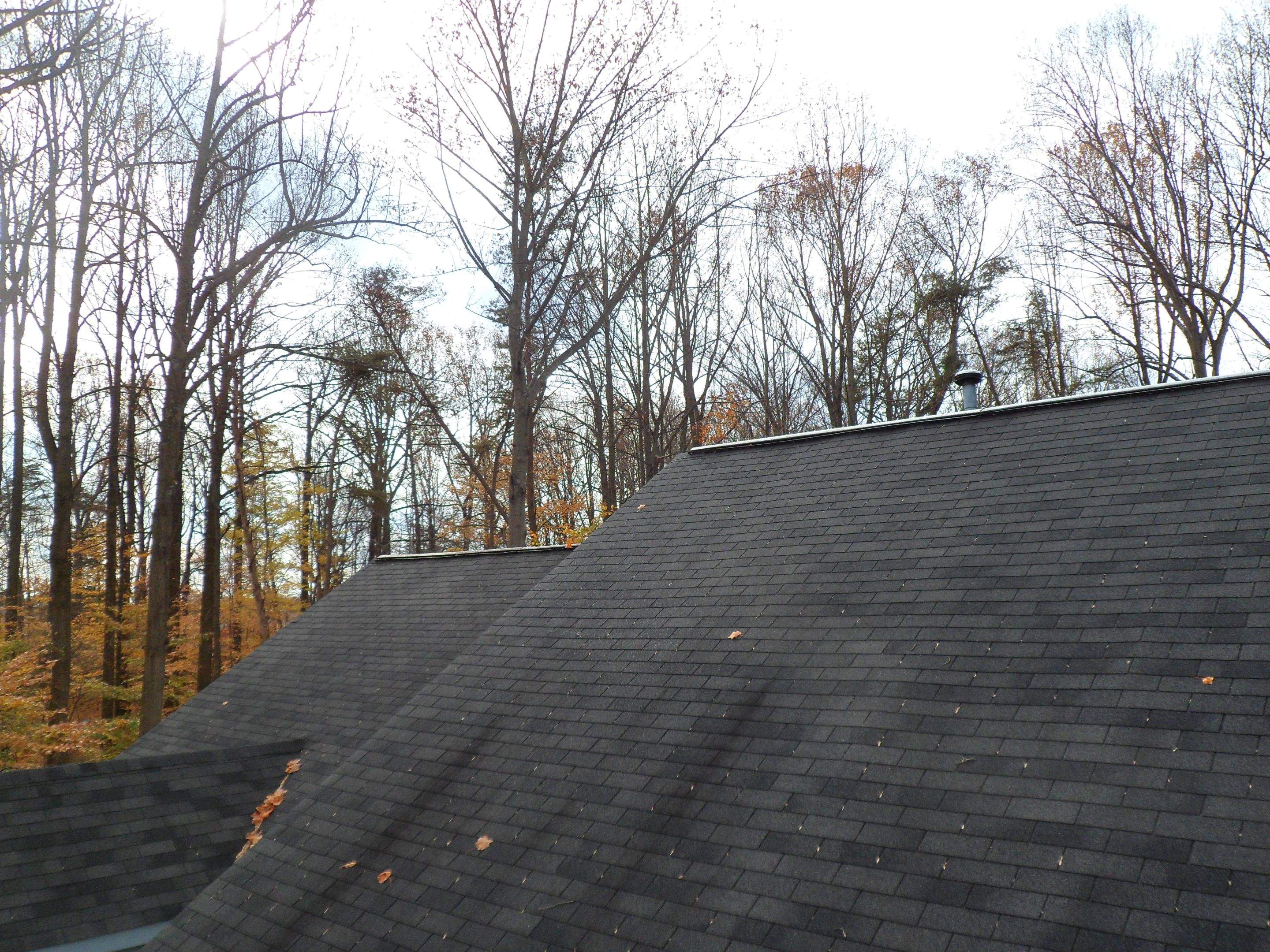 Residential Roofing Installation using Charcoal Black by Alpha Design Services