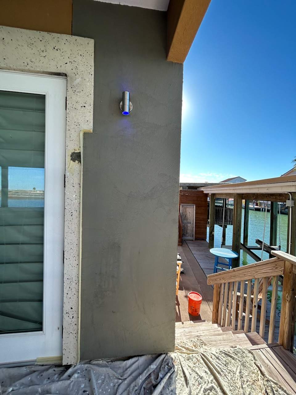 Waterfront Walkout Waterproofed! by Bayfront Roofing and Construction