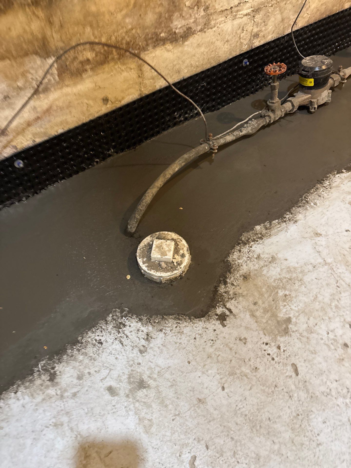 Interior Drain Tile & Sump Pump Installation in St. Paul, MN by Waterproofing Northeast