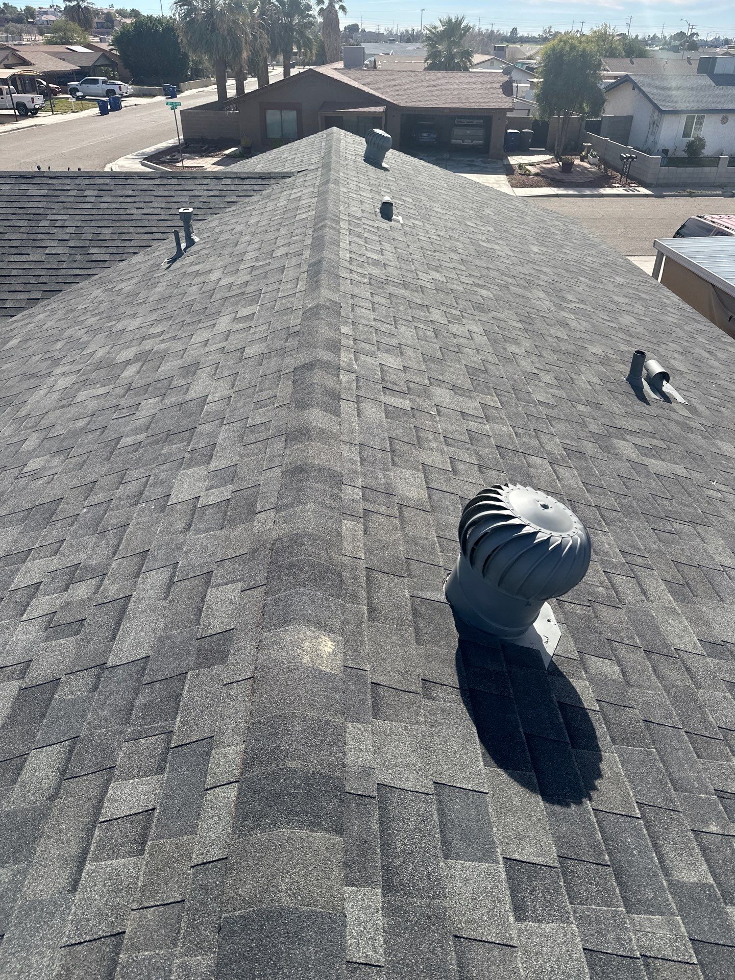 Estate Gray Shingles by Reimagine Roofing