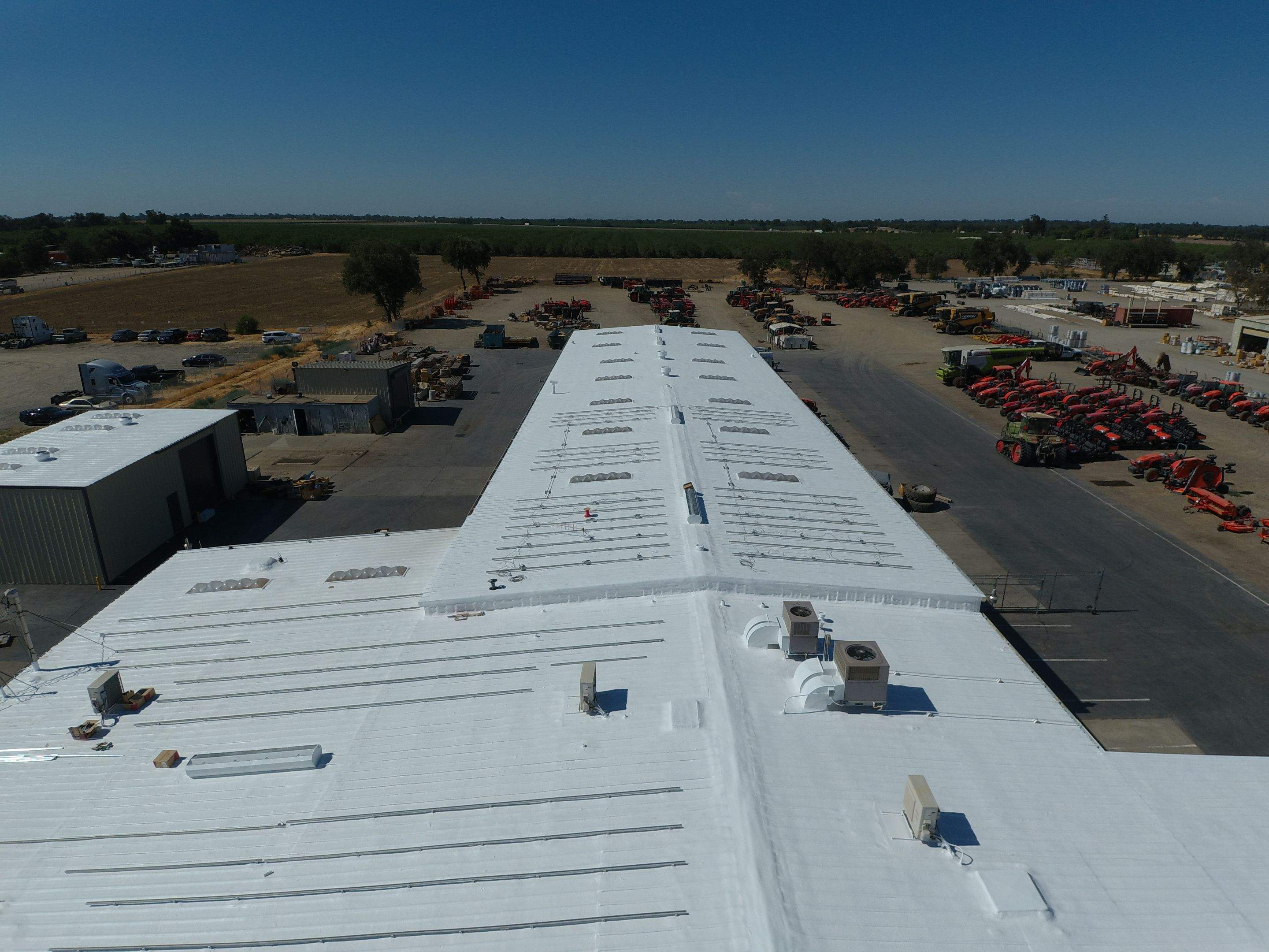 Spray foam and coatings using Conklin Benchmark/PUMA XL coatings and spray foam by Straight Edge Roofing Inc