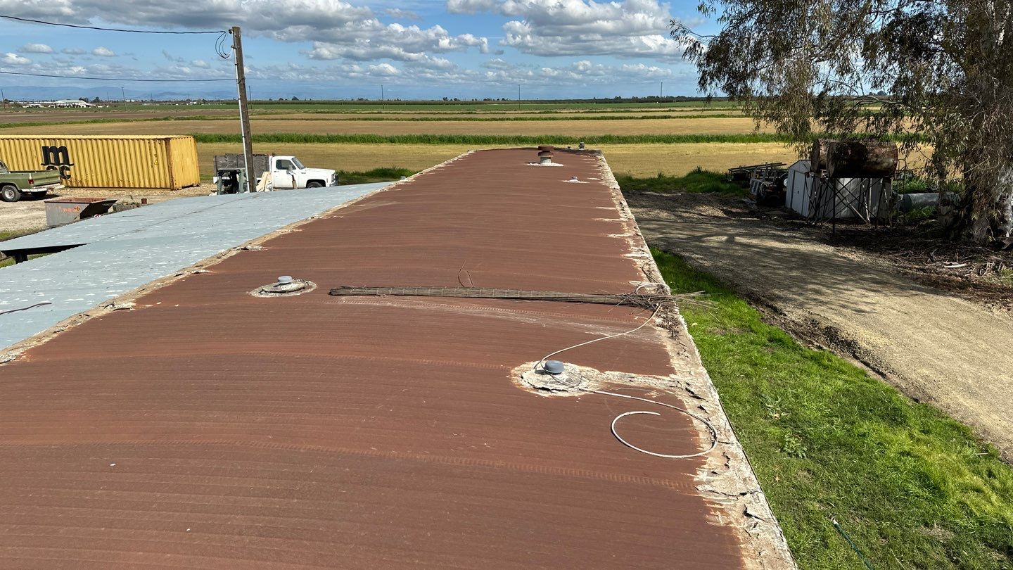 Foam and coatings on mobile home by Straight Edge Roofing Inc