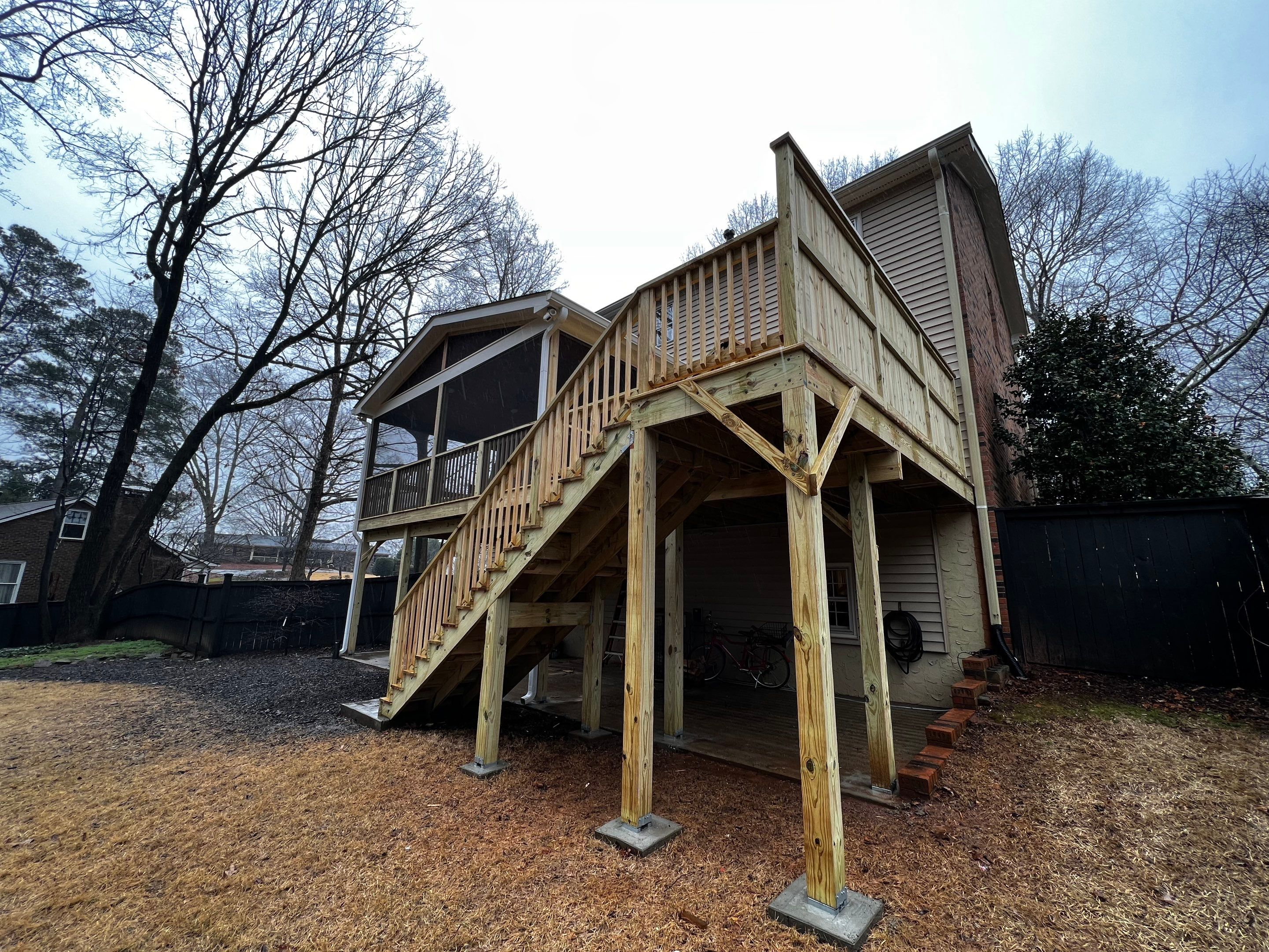 Custom Screened-In Porch and Elevated Deck Construction in Smyrna by Swift Home Renovations