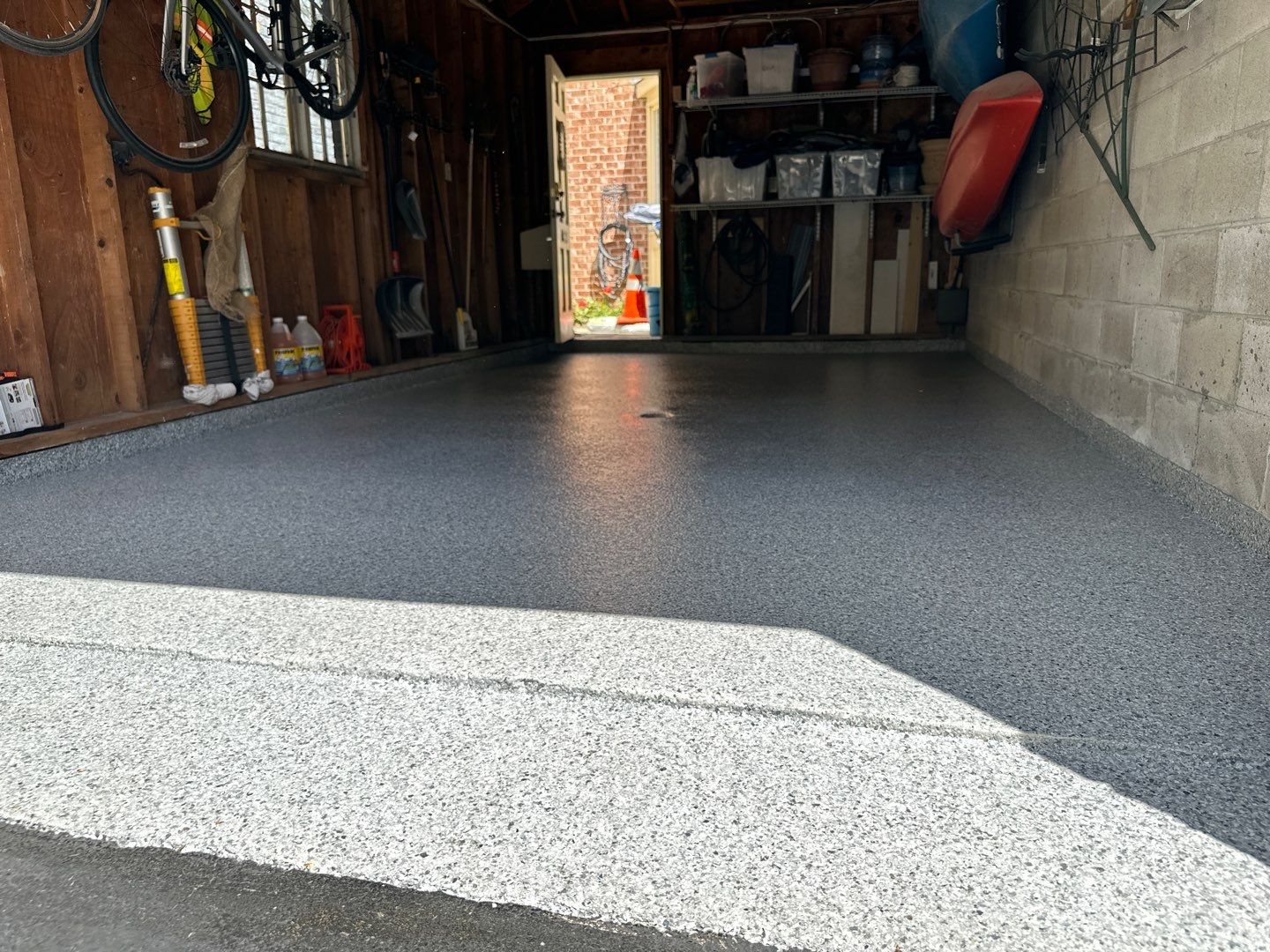 Silverado garage floor coating  by NG Masonry & Construction LLC