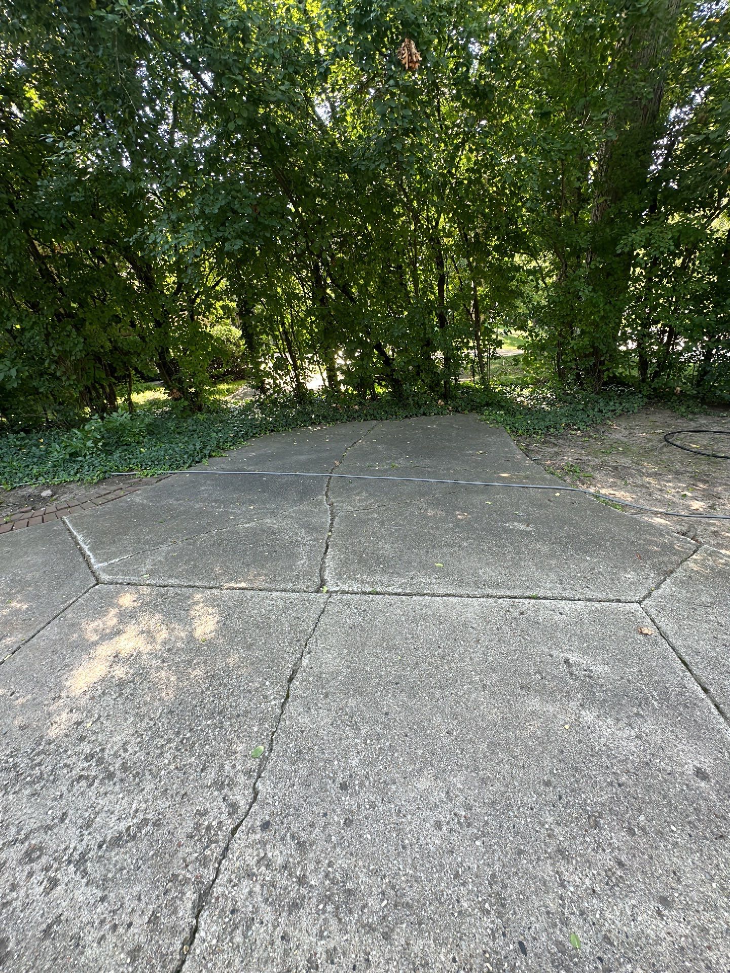 Aggregate concrete cleaning and sealing using Surebond SB-9000 by Northern Power Washing LLC.