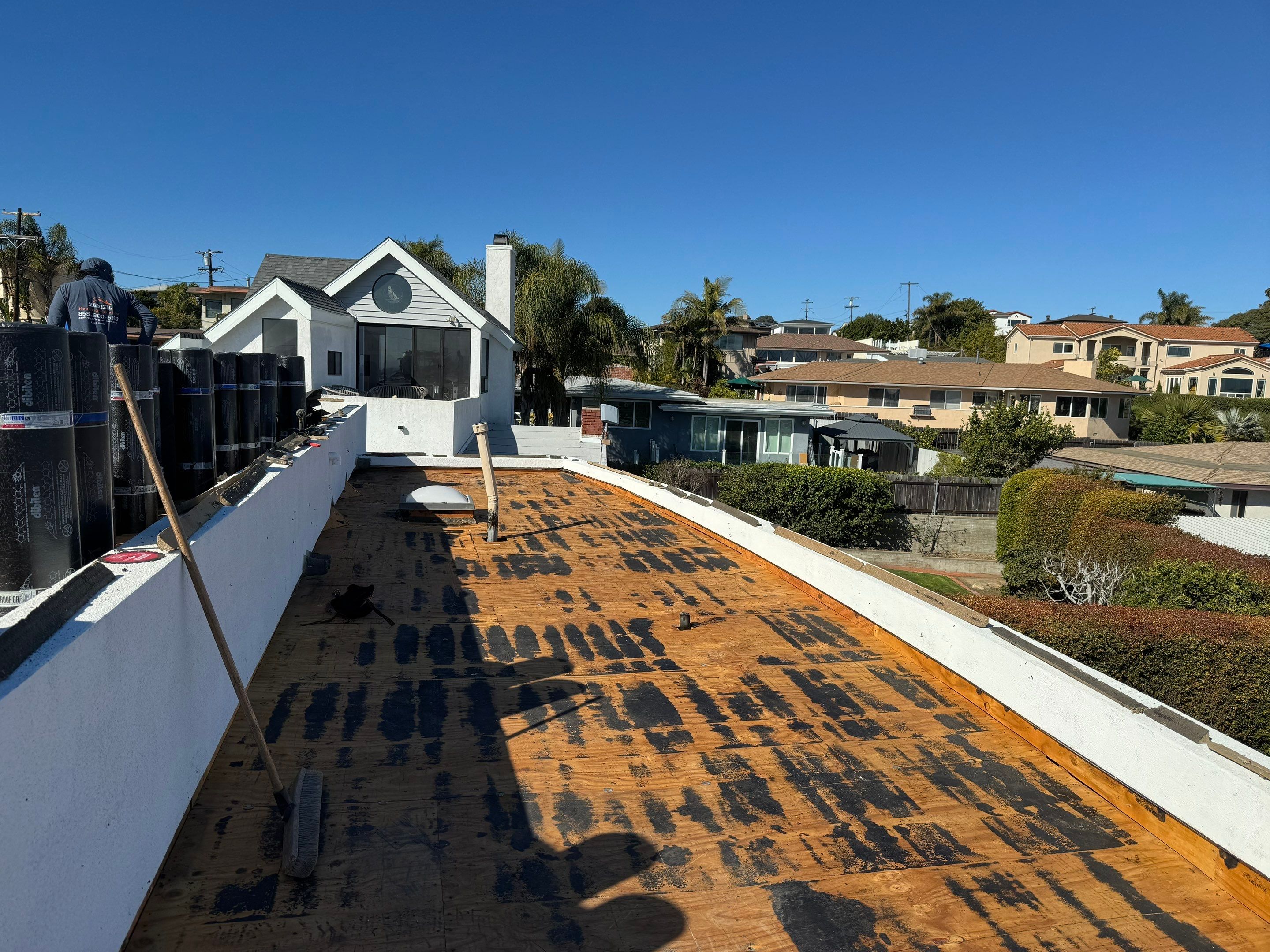 Point Loma Flat Roof Replacement – Johns Manville Bright White Torch-Applied Roofing System by Zenith Roofing Services 