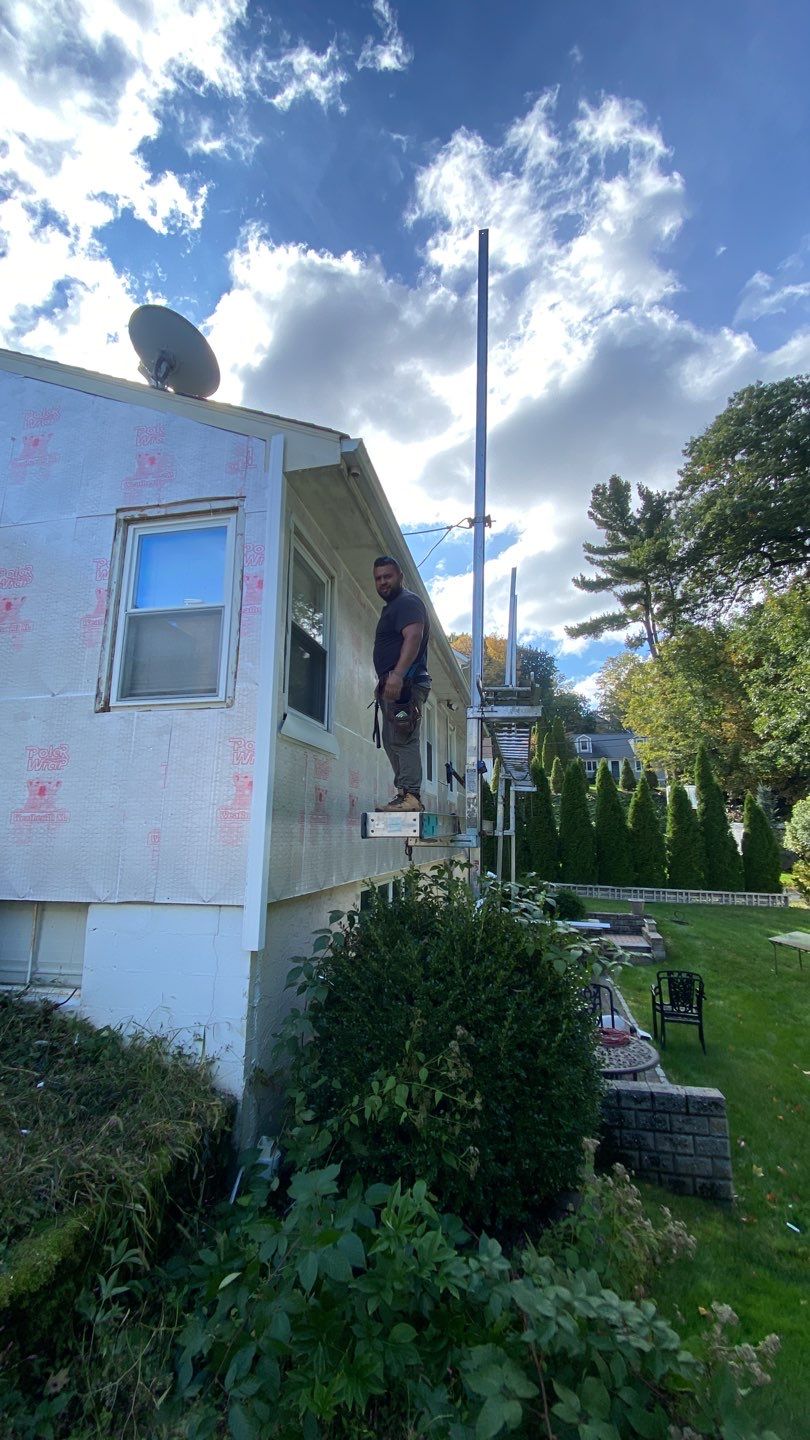 Siding Installation using CertainTeed monogram 4" double 4 Charcoal Gray by A Plus Exterior
