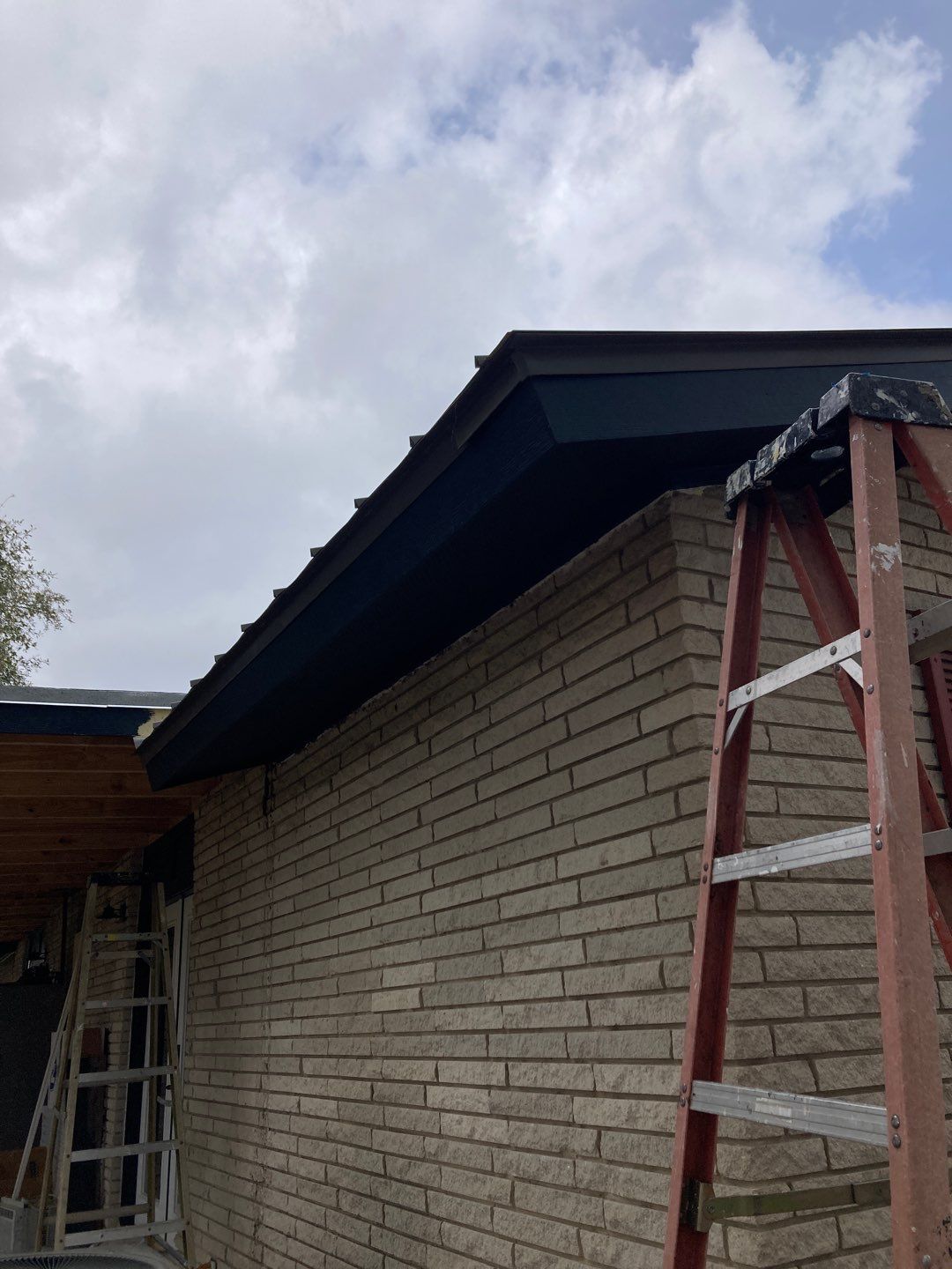 Beeville Backporch sittin' by Bayfront Roofing and Construction