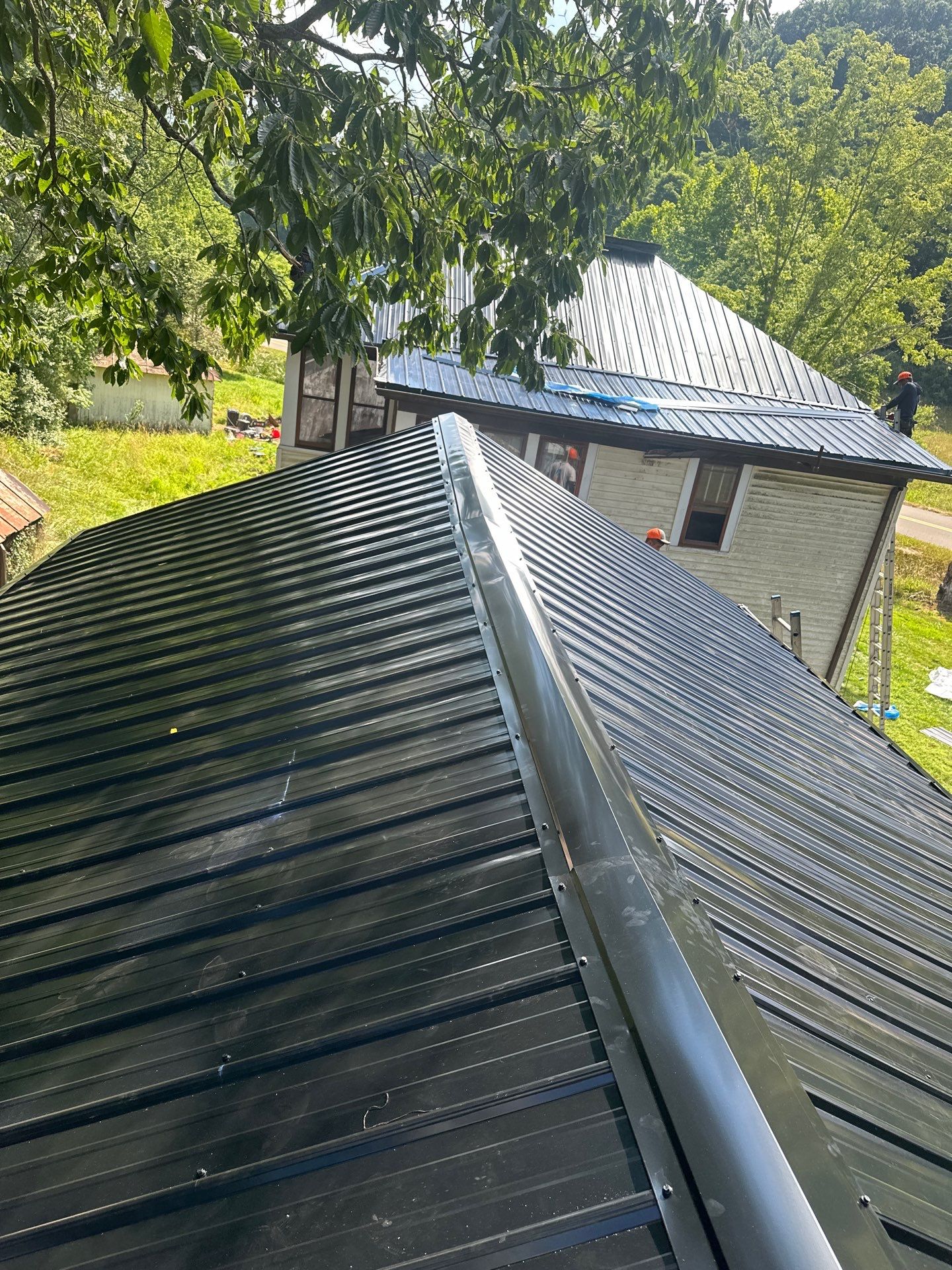 Residential Roofing Installation using Metal by Rainstoppers Roofing