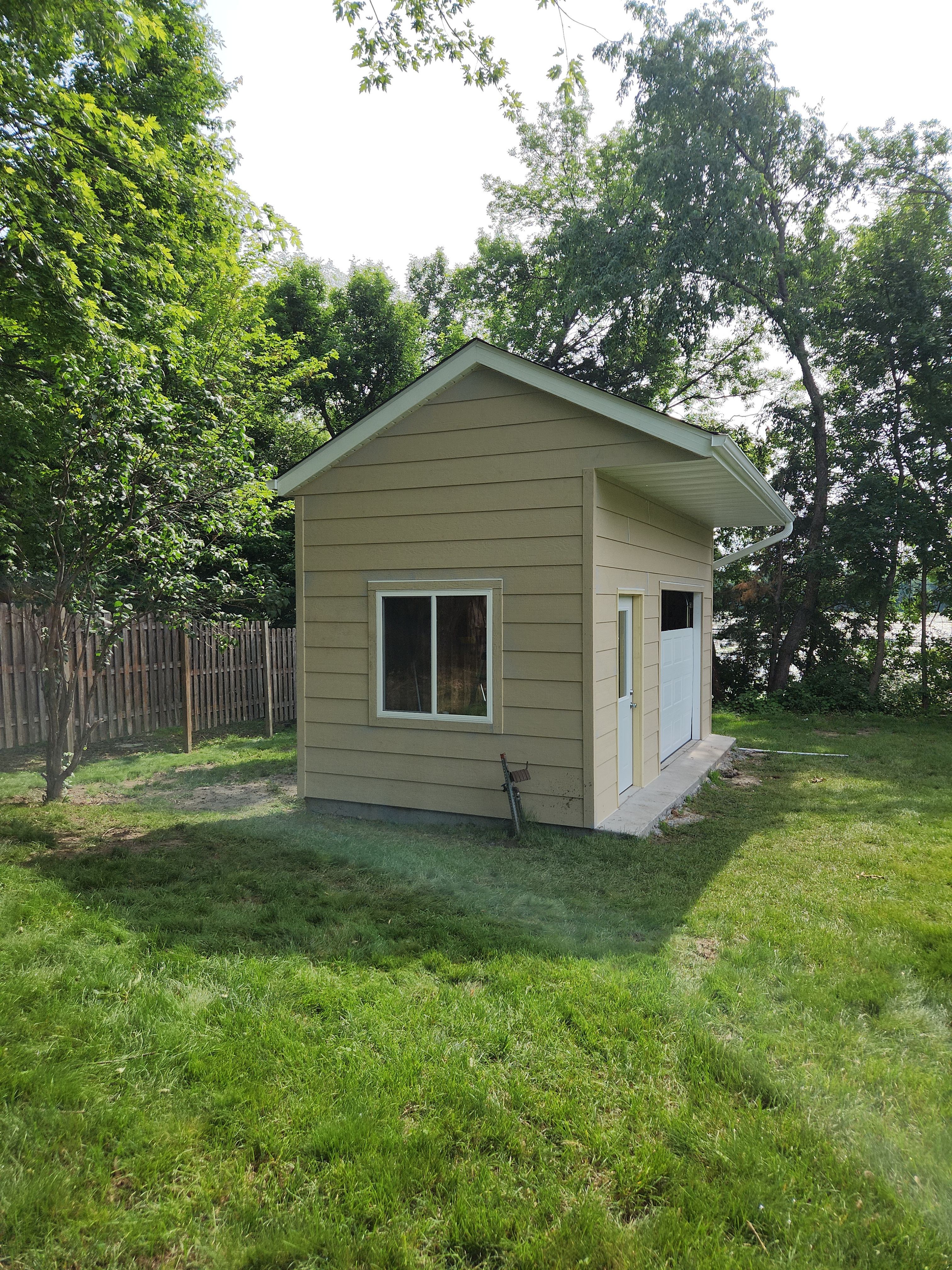 Roofing, Siding & Gutters on Shed Makeover by Next Level Seamless Gutters / Exteriors Inc.