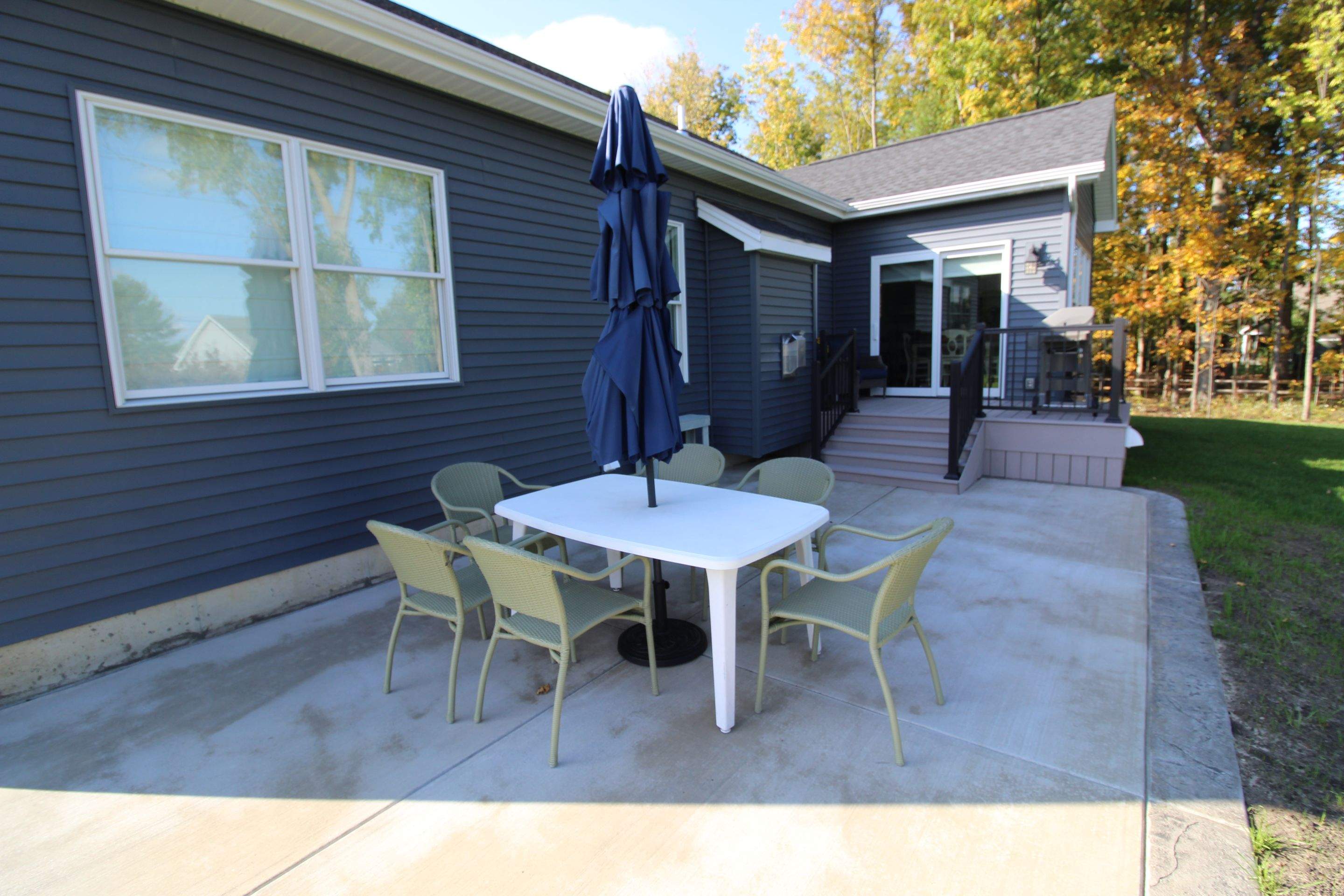 Outdoor Living- Deck and Concrete by Ivy Lea Construction