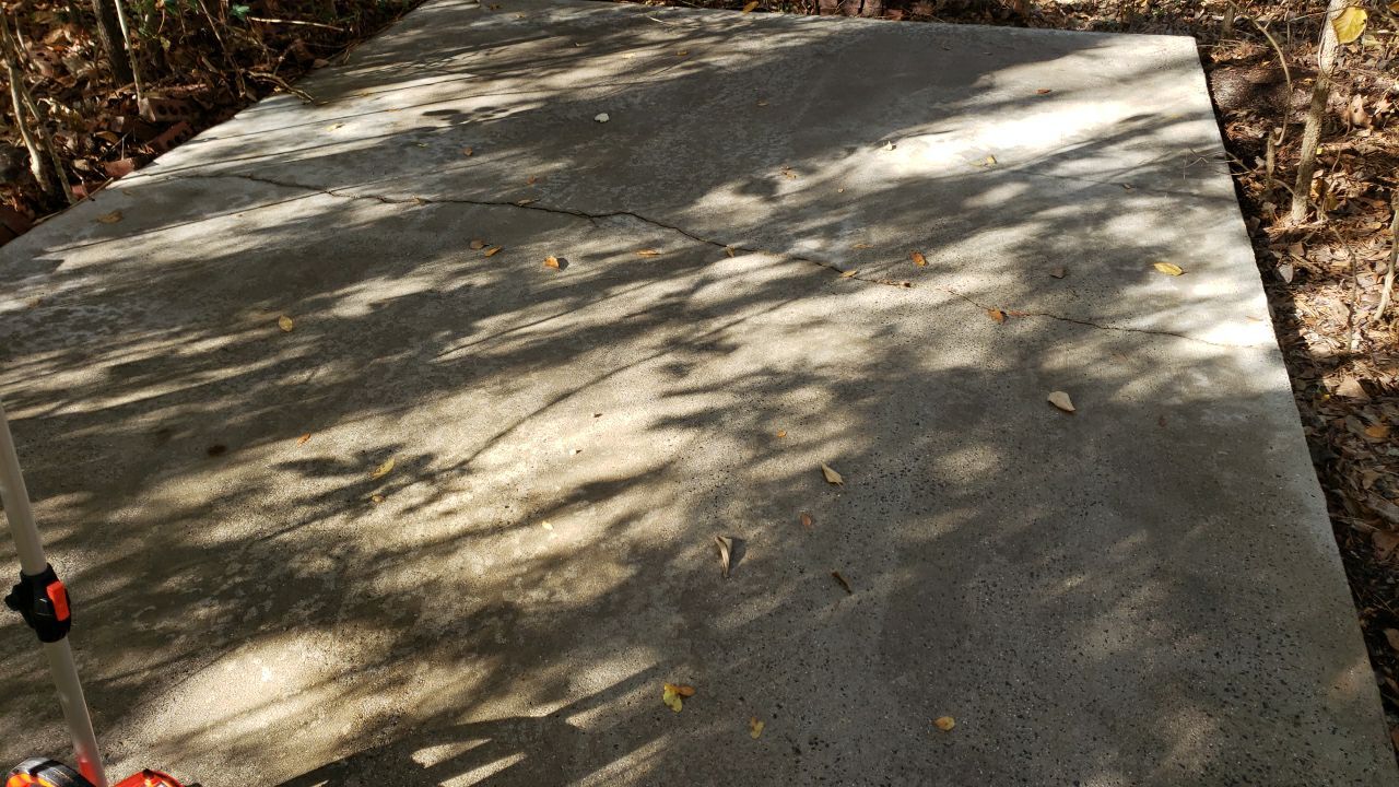 Driveway Clean using cleaner by Power Wash Masters LLC