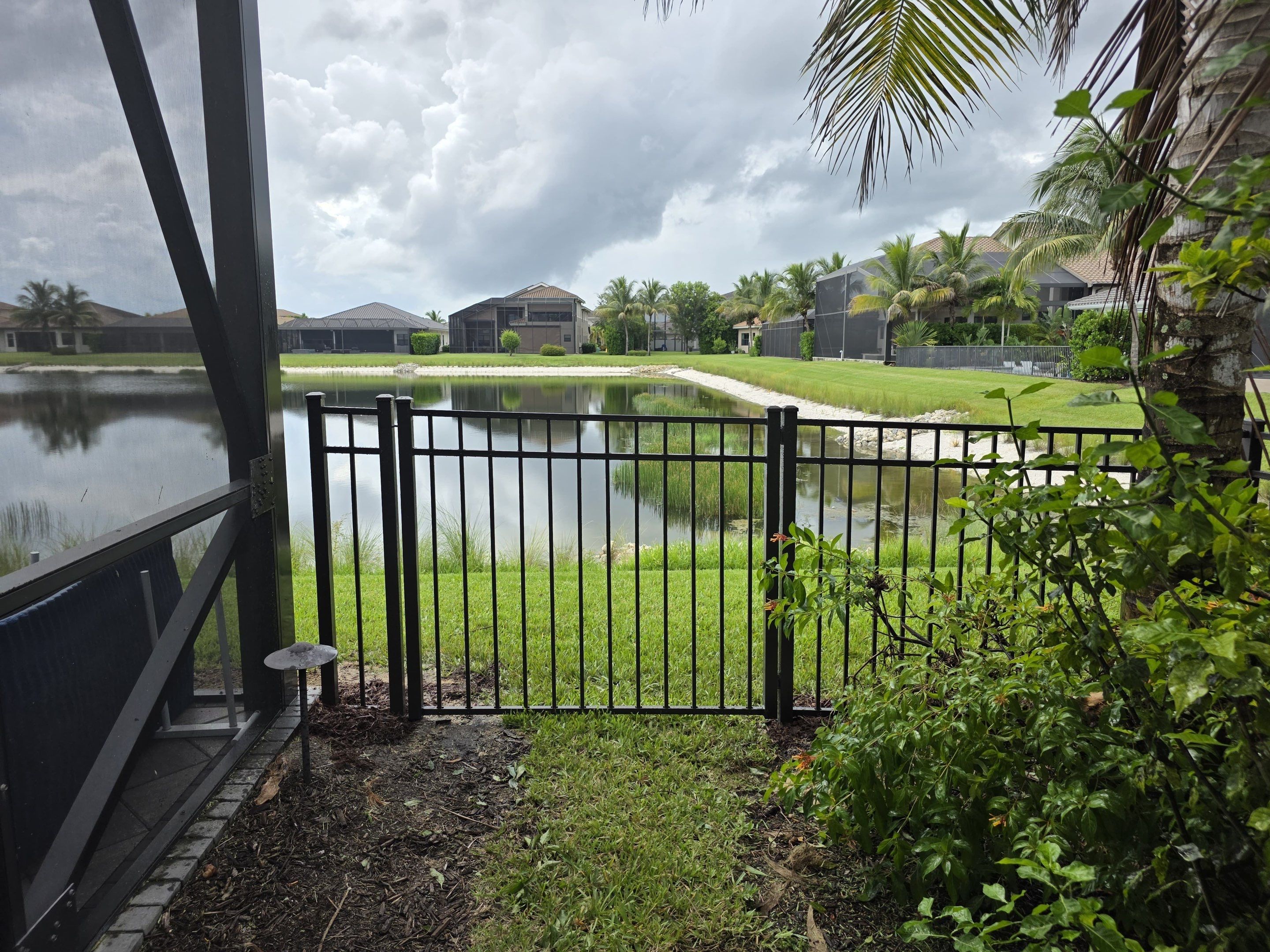 Black Aluminum Picket Fence and Gate Installation in Naples by True Fence LLC