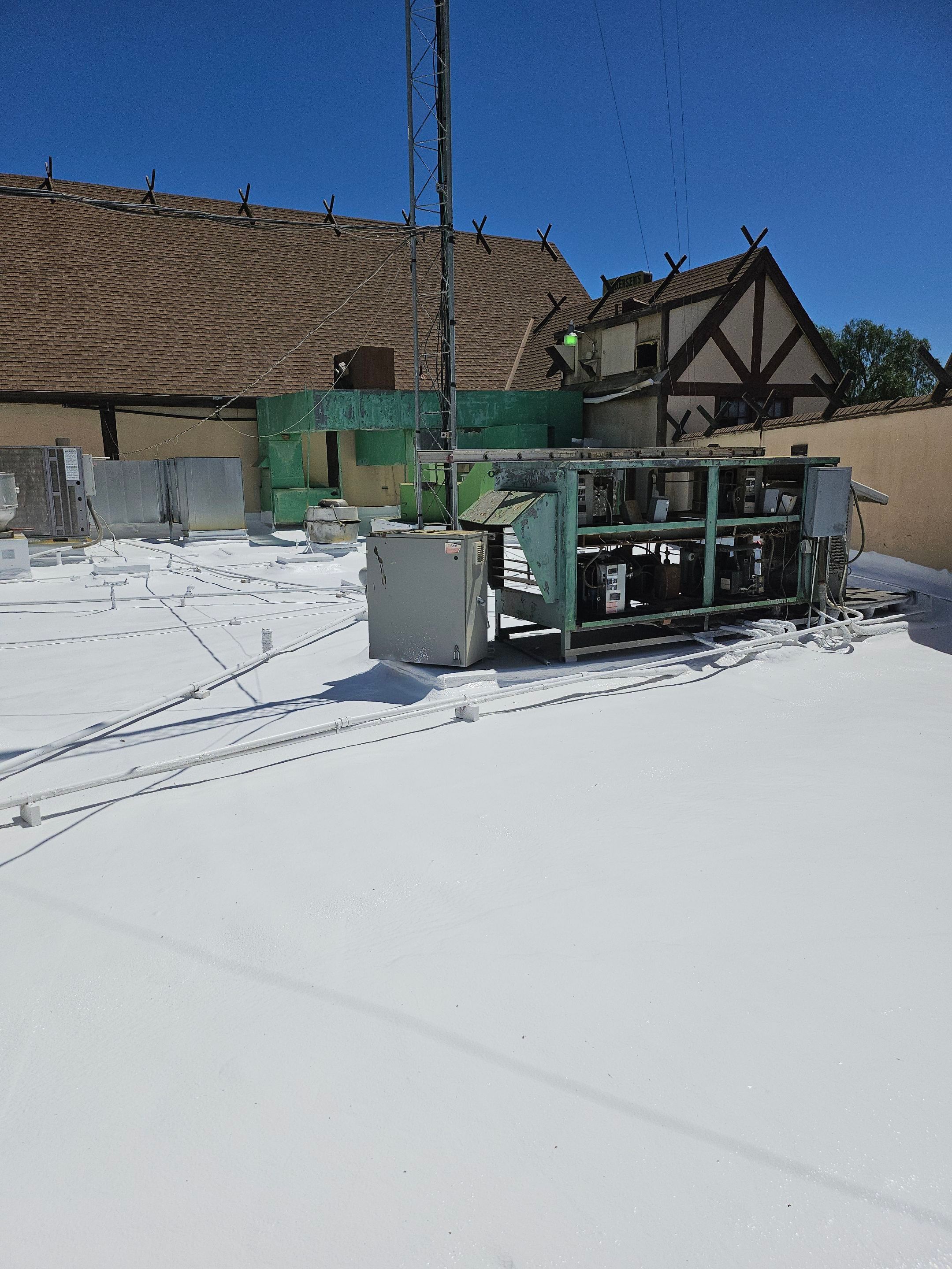 Spray foam and coatings using General Coatings acrylic coatings and spray foam by Straight Edge Roofing Inc