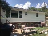 Siding Installation using James Hardy Cedar Mill Plank by ExteriorPros