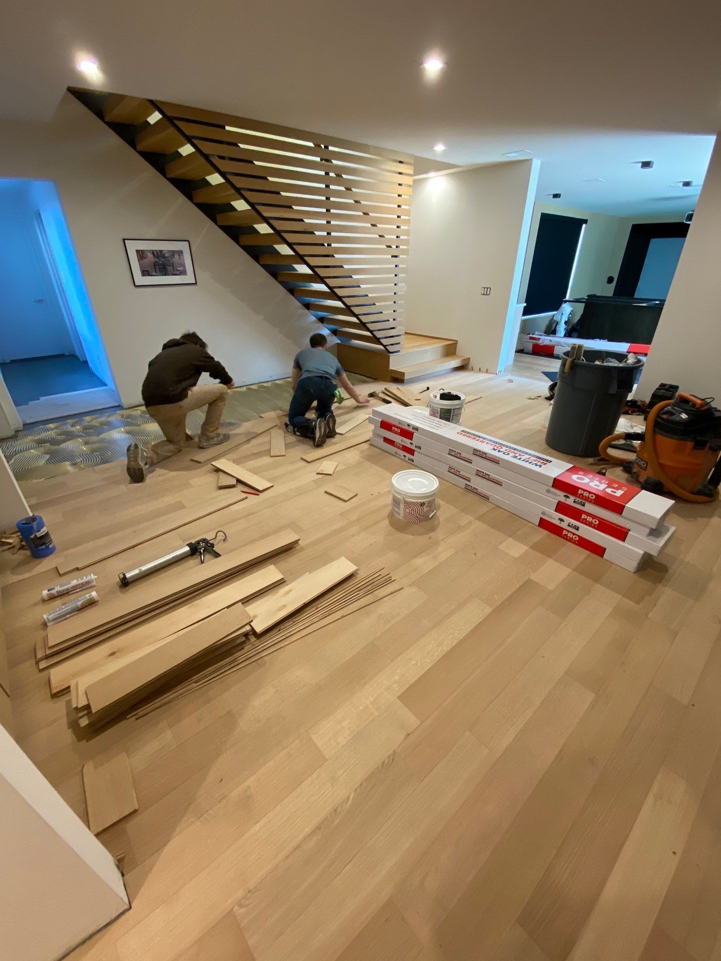 Basement Remodel using Engineered White Oak by RTBaldwin Hardwood Floors