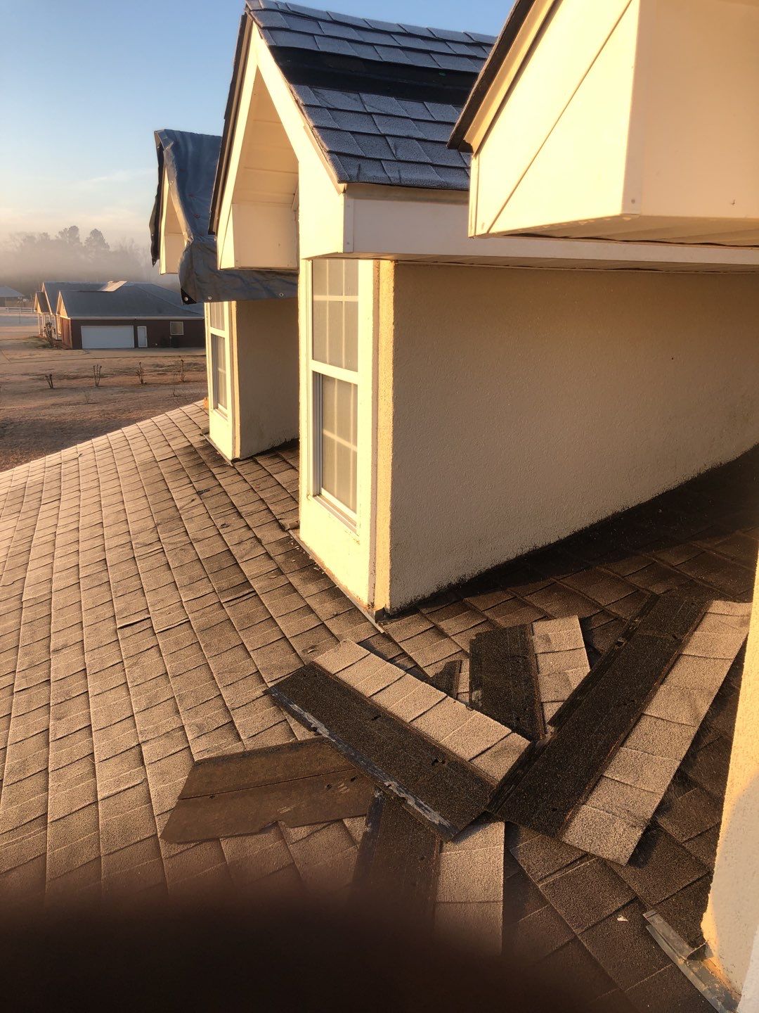 Residential Roofing Installation using Roof Replacement by American Roofing & Construction LLC
