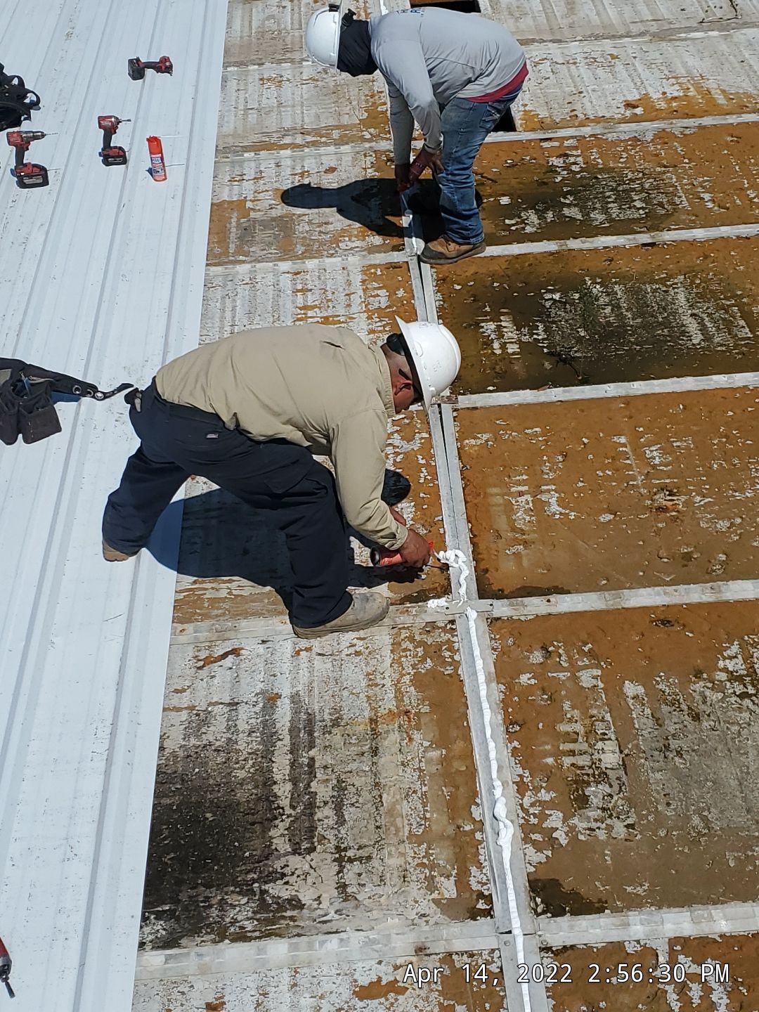 Commercial Roofing Installation using Aluminum Roofing panels by Hostetler Roofing