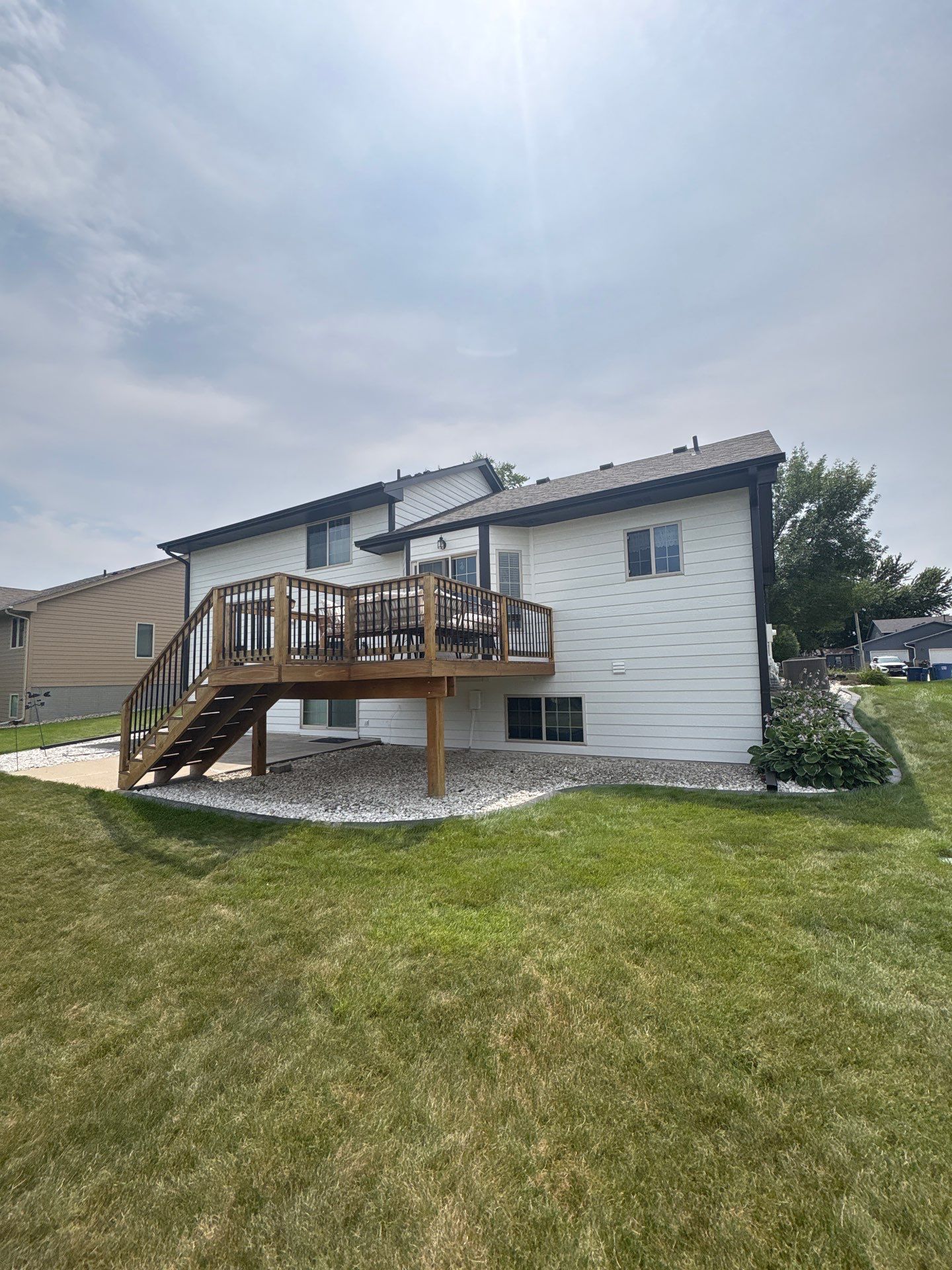 Residential Exterior Painting and Siding Refresh in Sioux Falls by Select Painting, Coatings & Garage Cabinets