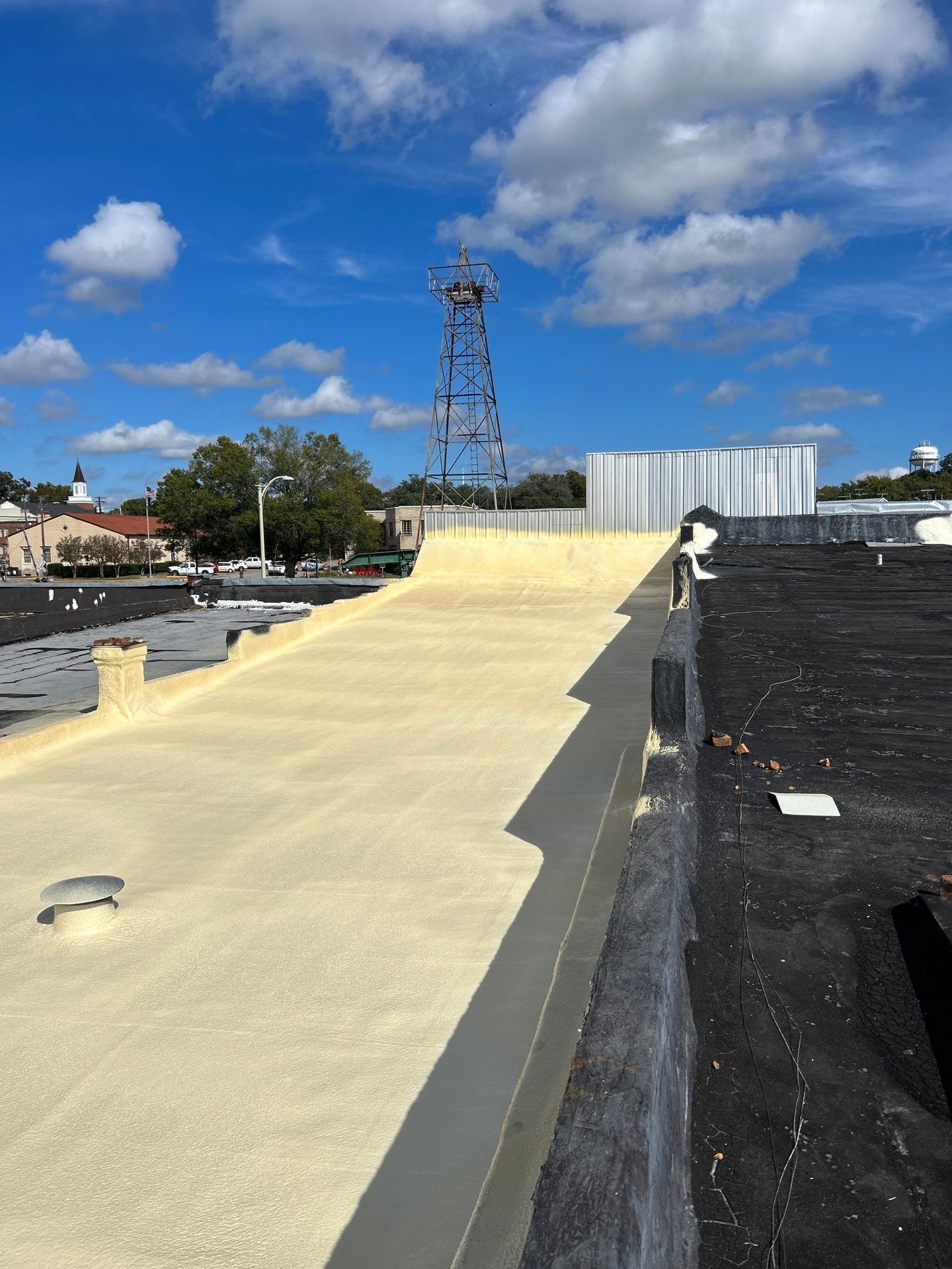 Downtown Gladewater Commercial Foam Roof Restoration – SPF + High-Tensile Acrylic by All Star Roofing LLC