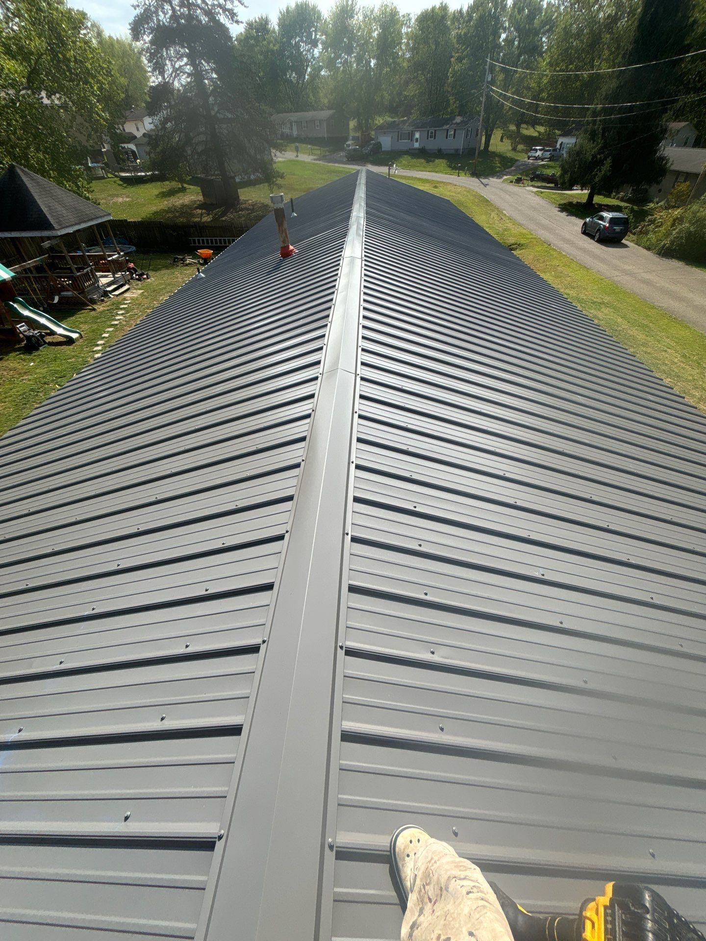 Residential Roofing Installation using Metal by Rainstoppers Roofing