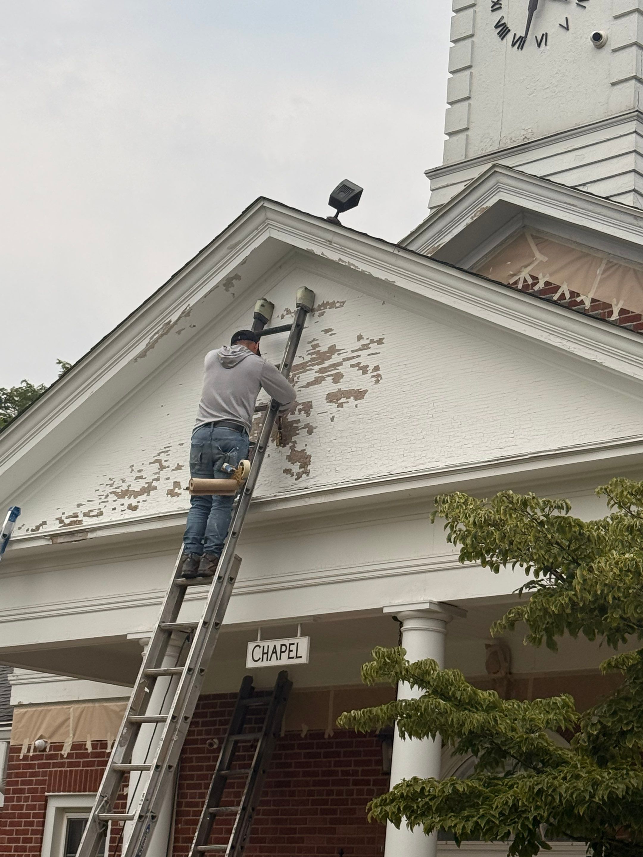 Commercial Wood Trim Restoration and Gutter Replacement in Birmingham by Top Shelf Painter