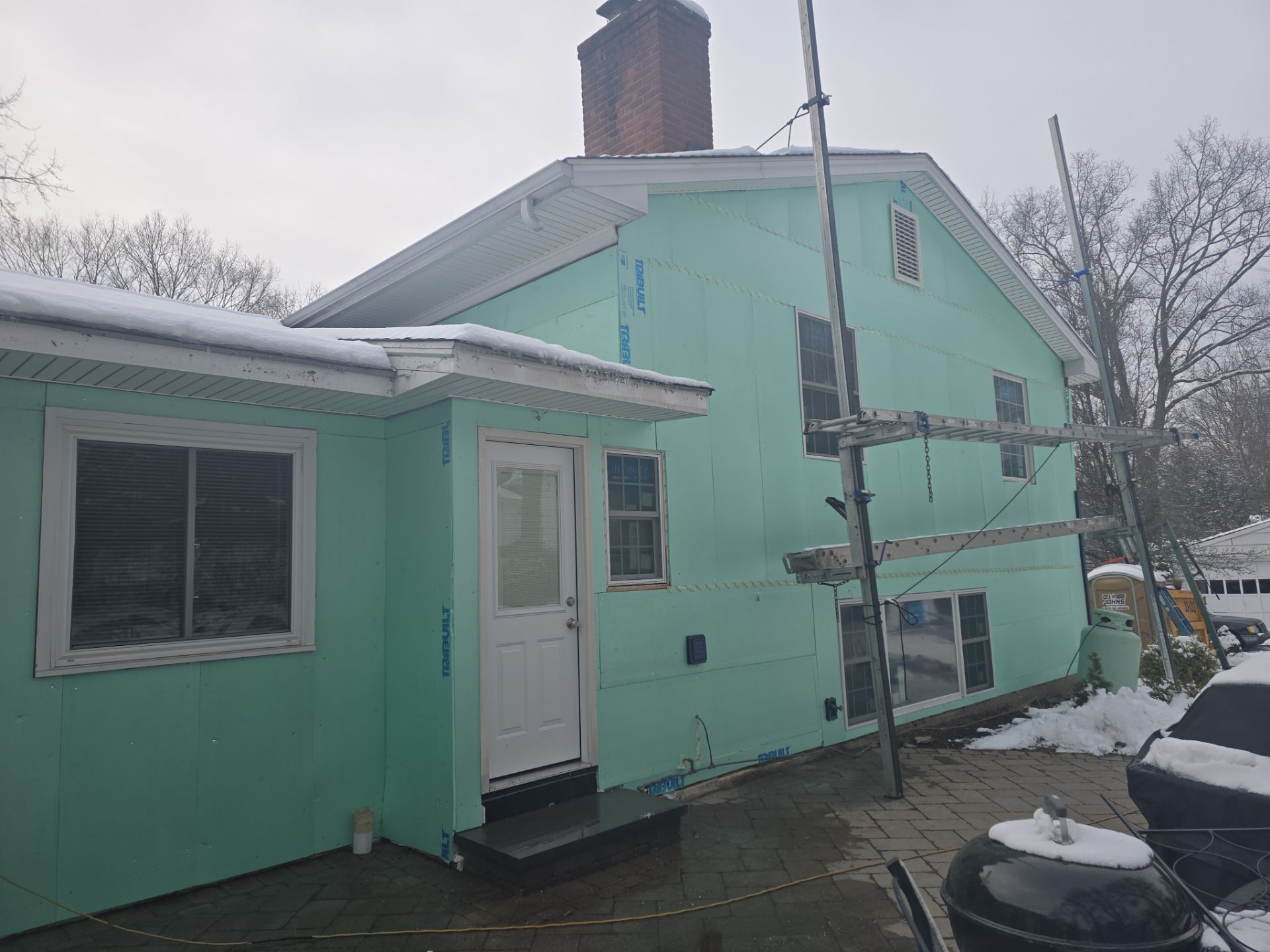 Elevated Siding with Cert Cedar Impressions D/7 Perfection straight bottom, Midnight Blue and Cert Monogram D/4 x 25' clapboard, Midnight Blue by DiGiorgi Roofing and Siding Inc