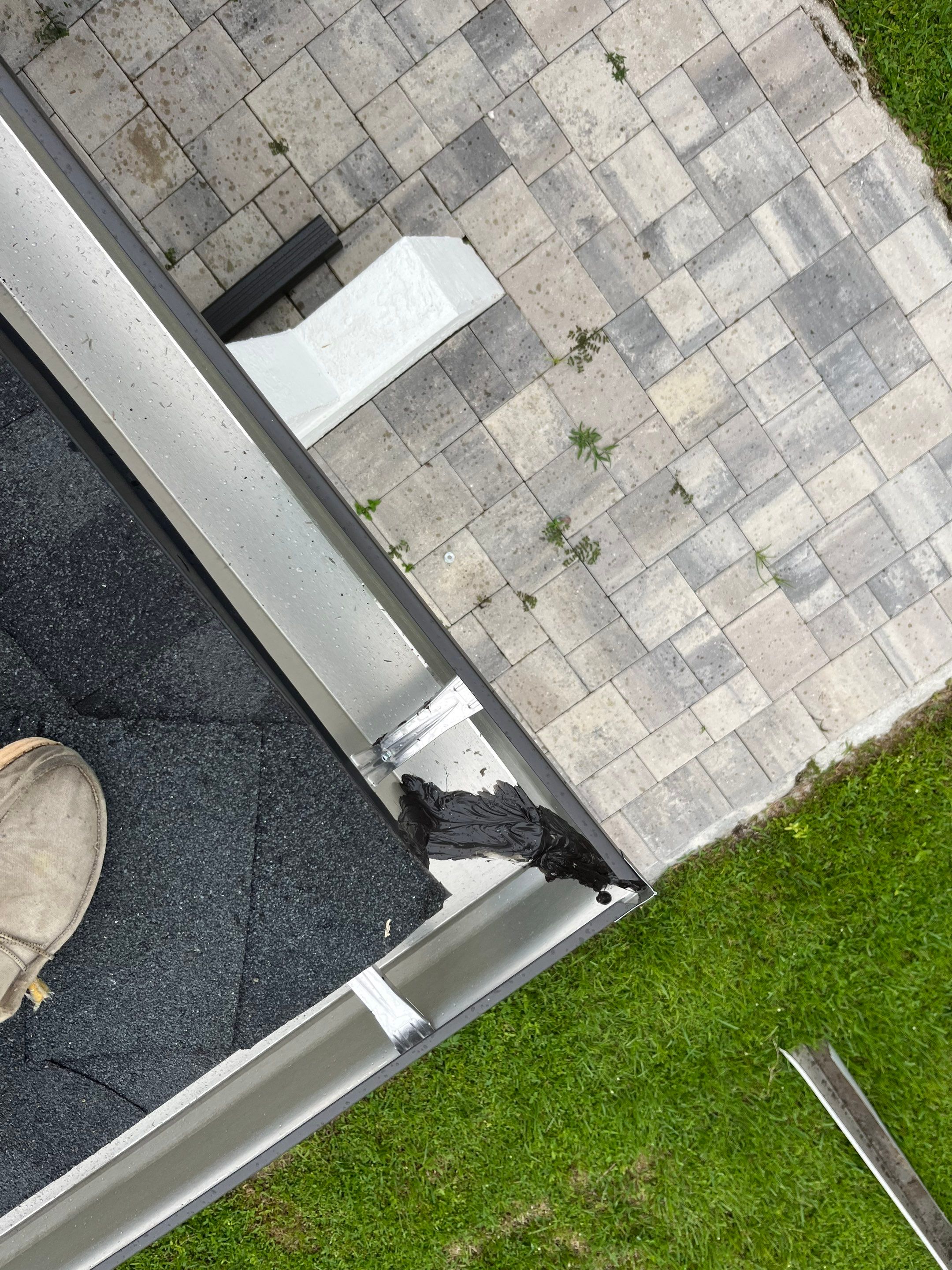 Black Seamless Gutters for a Modern Look in Cape Coral FL by Gutter Professors
