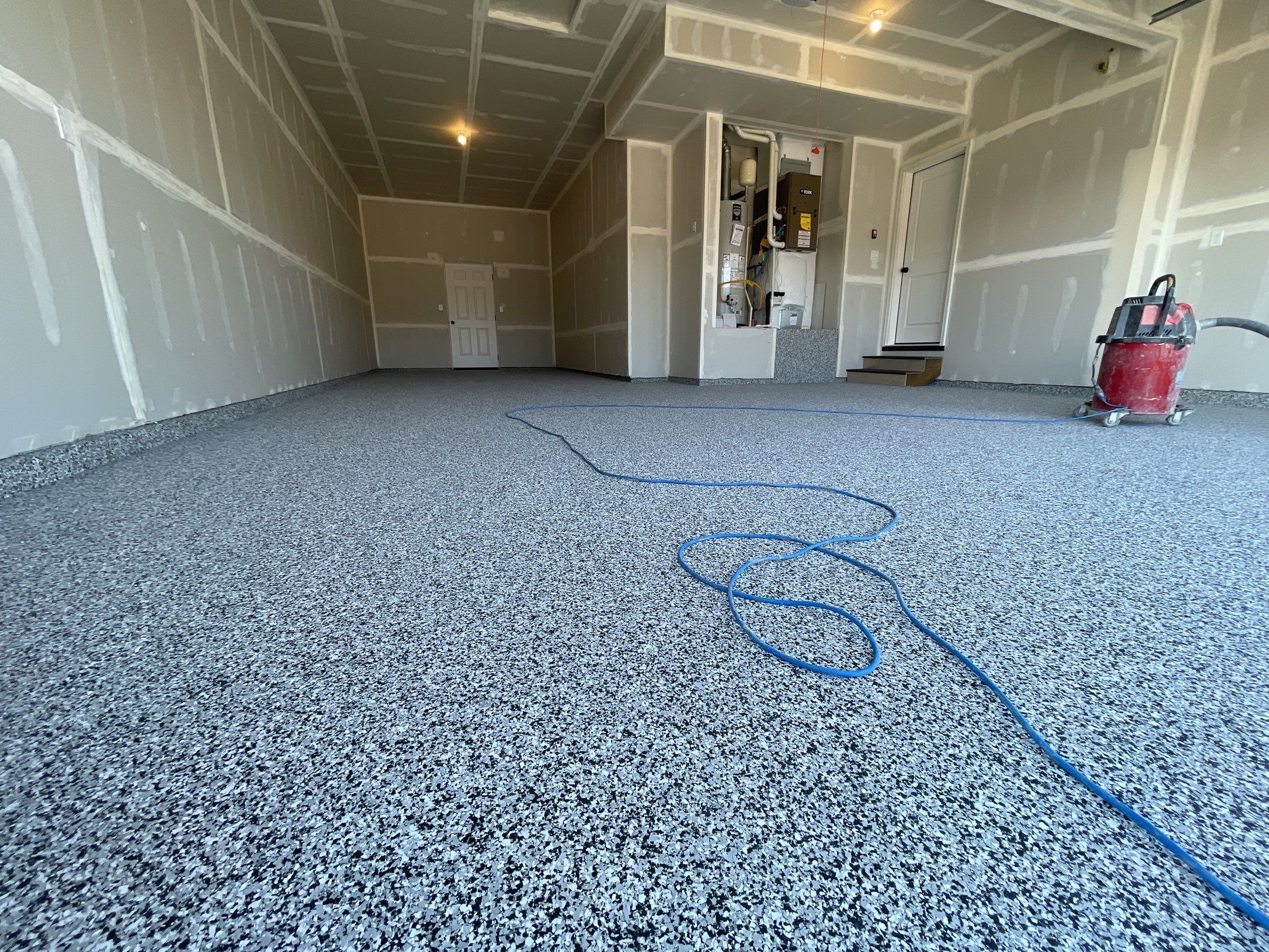 Garage Transformation using Domino by Croc Coatings, LLC