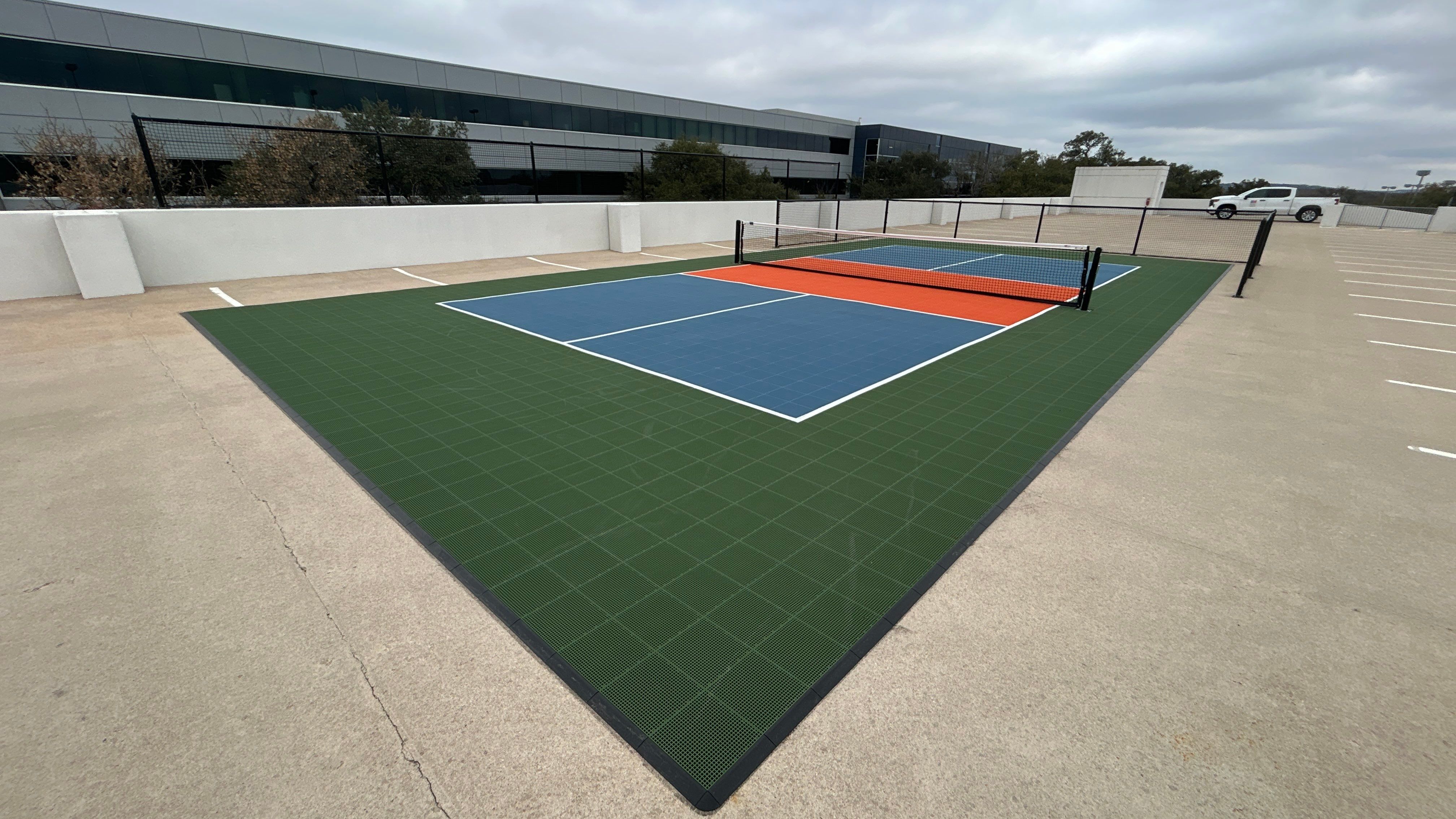 Travis Oaks Parking Garage by Sport Court Austin