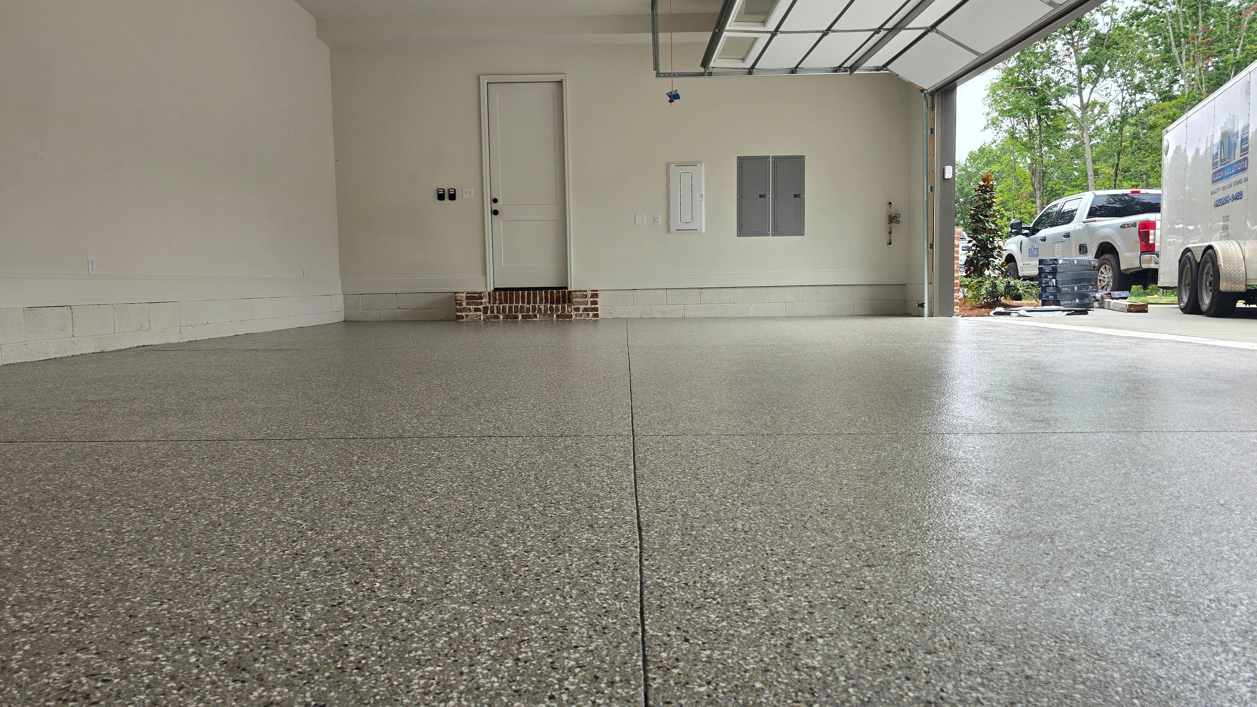 Garage Using Creekbed  by Elite Floor Solutions