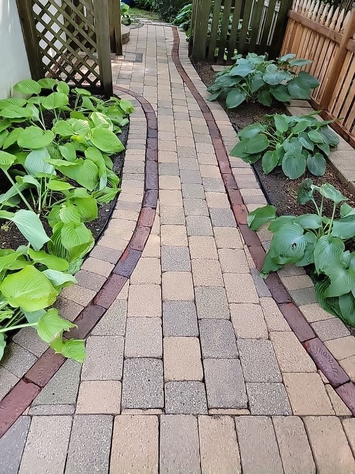Glencoe, IL brick paver clean sand seal, repair, and reseal by Northern Power Washing LLC.