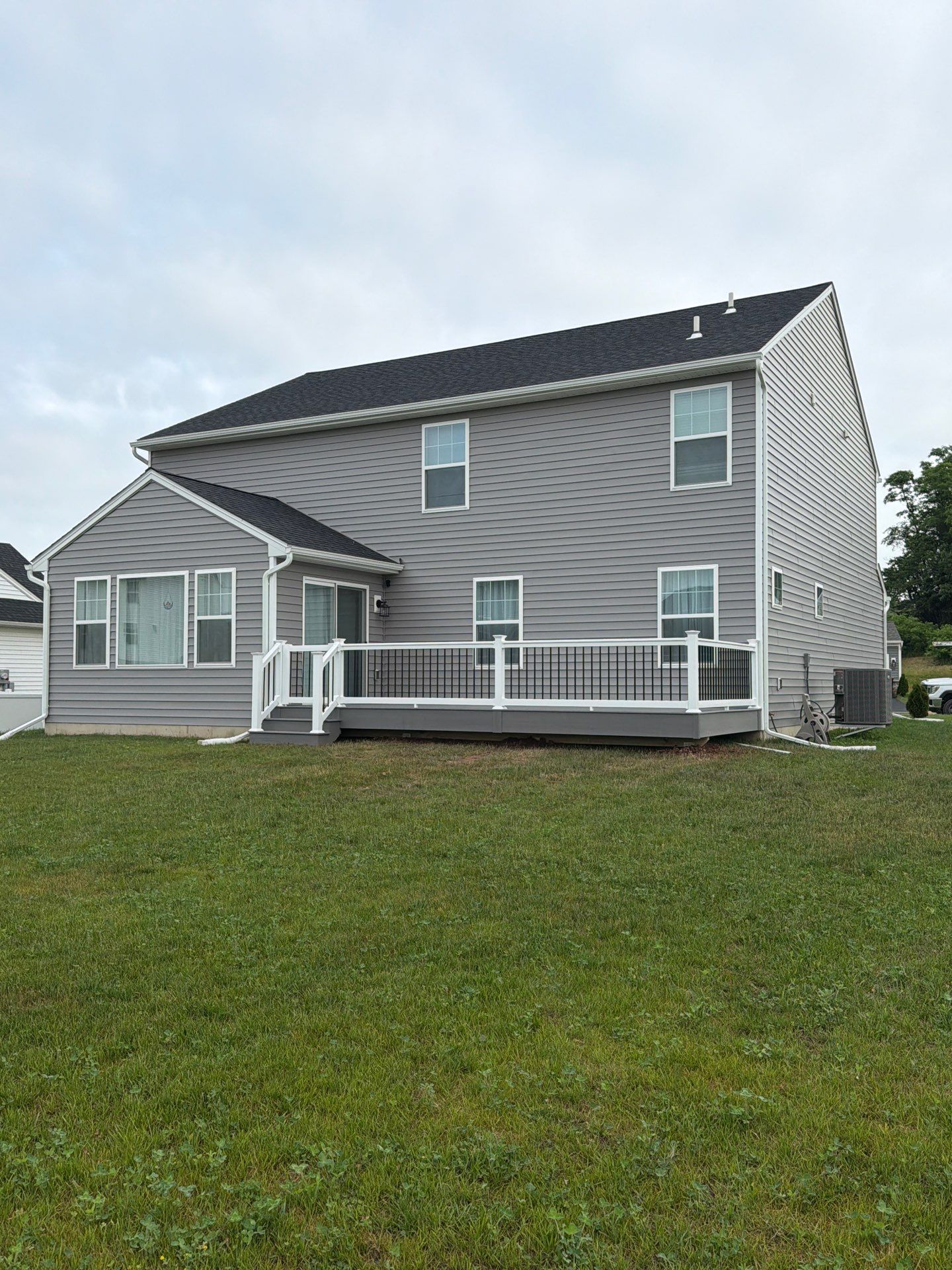 Custom Gray Composite Deck Installation in Duncannon by Esh Builders
