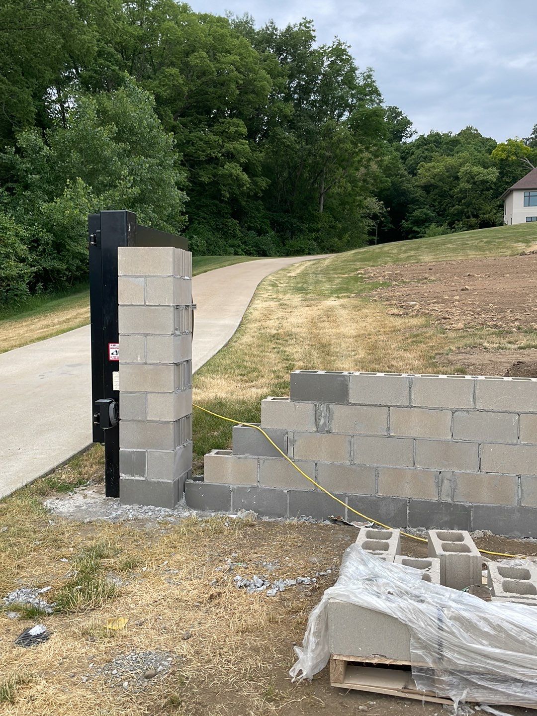 Fence / Retaining Wall using Block then parge by ACE Waterproofing & Basement Solutions