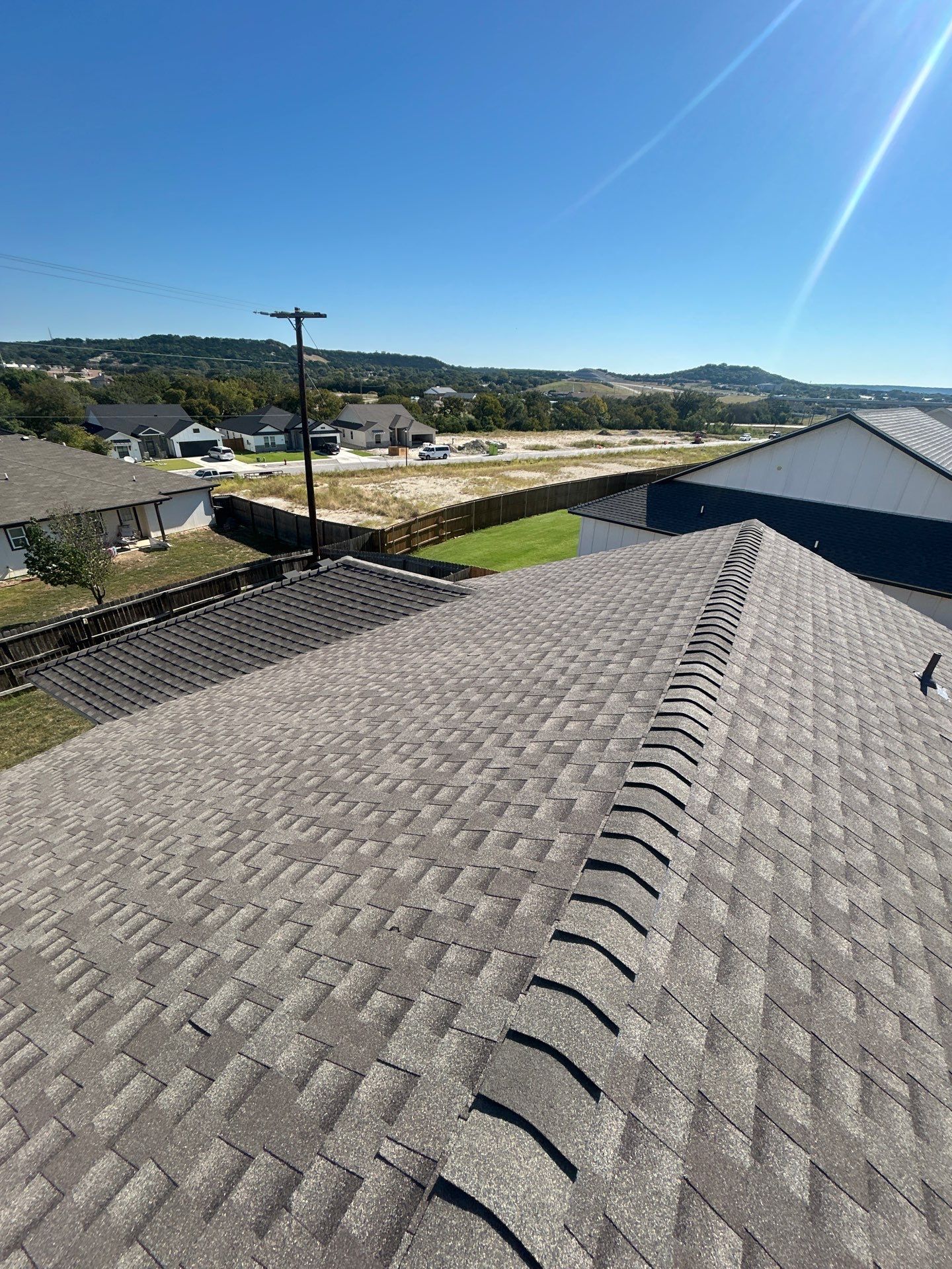 Residential Roof Replacement using GAF - HDZ - Weathered Wood by Action Exteriors Austin