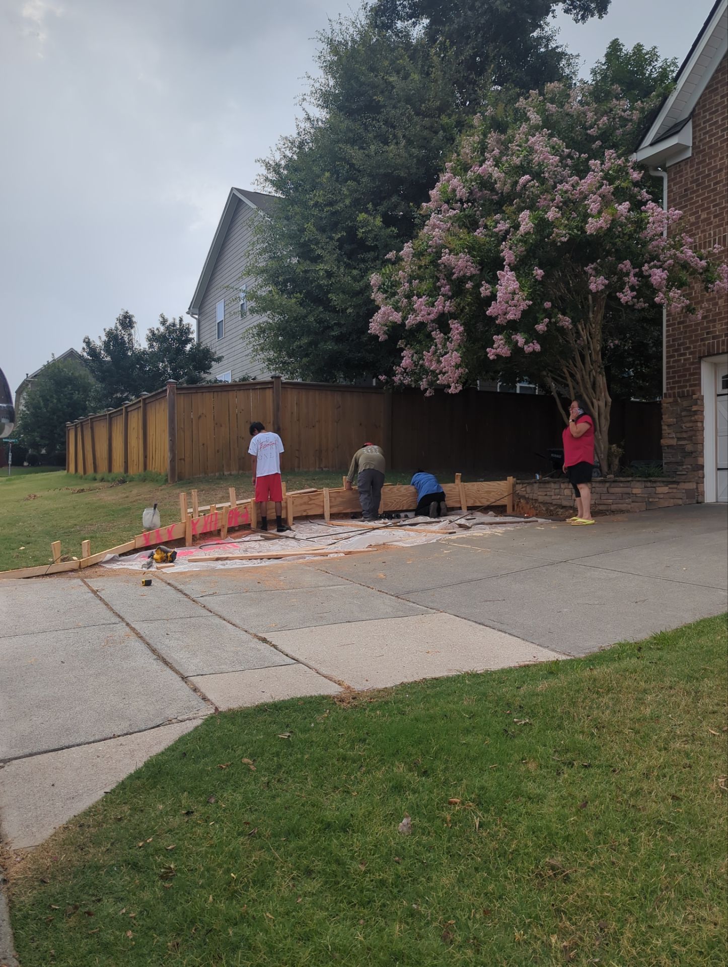 Concrete Driveway Expansion & Retaining Wall | Apex, NC by Elite Remodeling and Design LLC