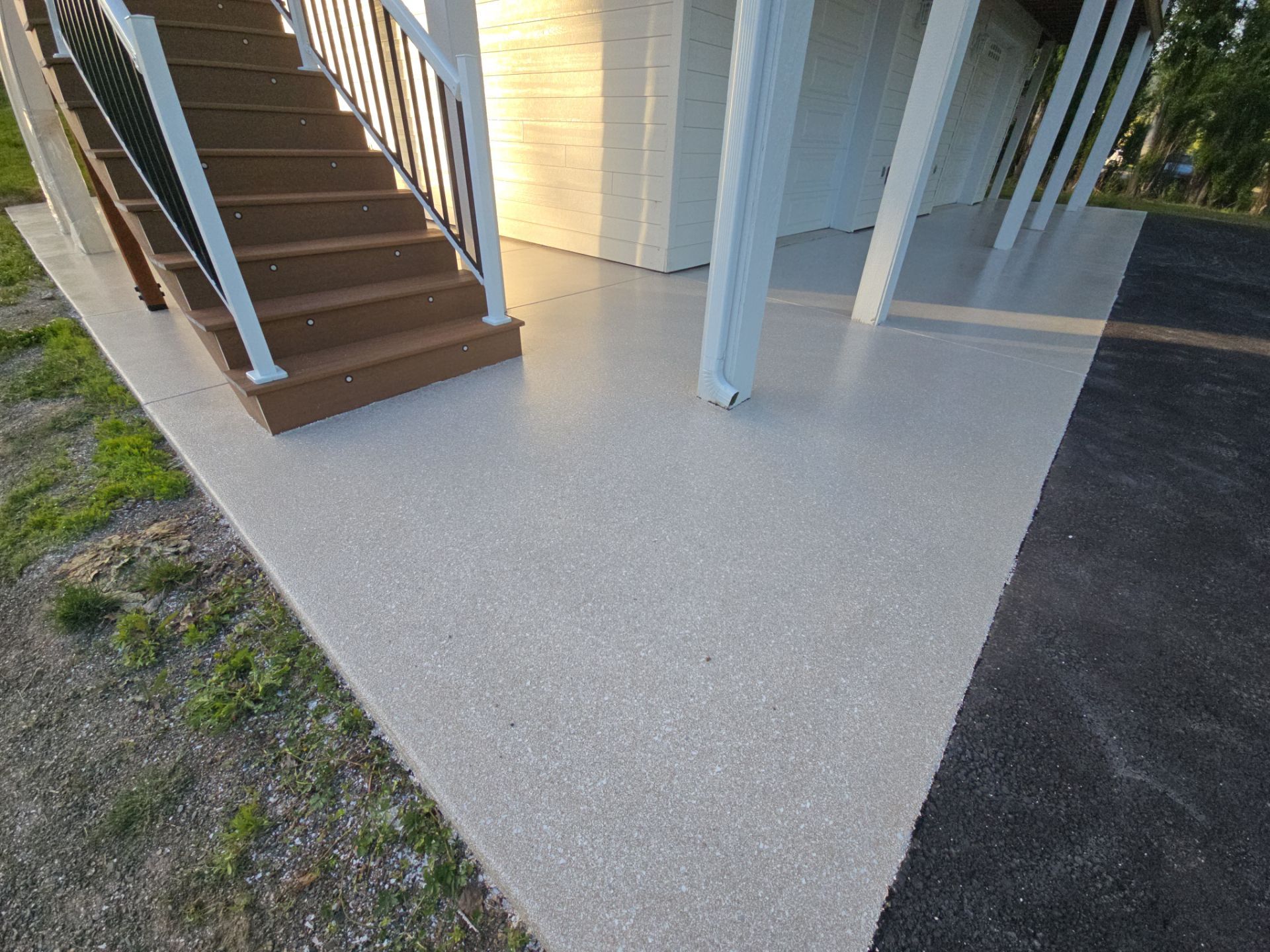 Patio Transformation with Sandstone Penntek Flooring by Croc Coatings, LLC