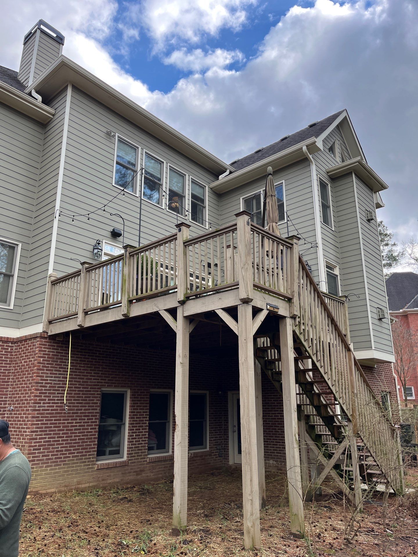 Tucker, GA Covered Porch Build and Deck Replacement using Deckorators Voyage Series Decking by Nelson Exteriors 